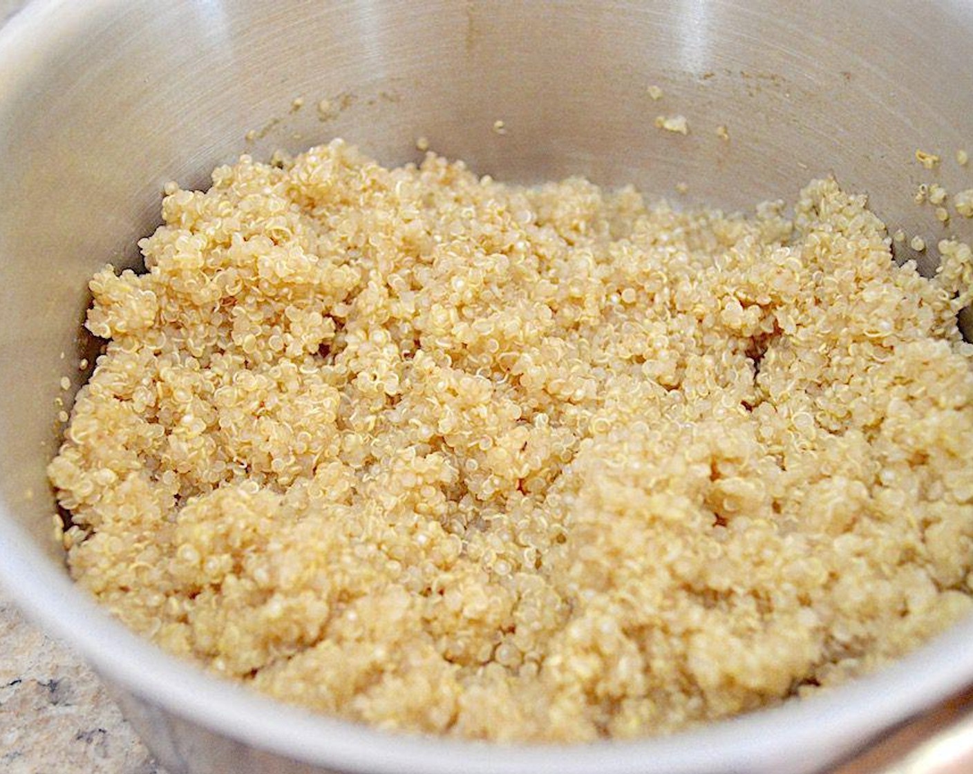 step 2 Bring the Vegetable Stock (2 cups) to a low boil in a big saucepan on the stove, then stir in the Quinoa (1 cup). Cover the pan and turn the heat to low. Let it cook until tender for 15 to 20 minutes. Fluff it up with a fork. While cooking, you can work on the sweet potato.