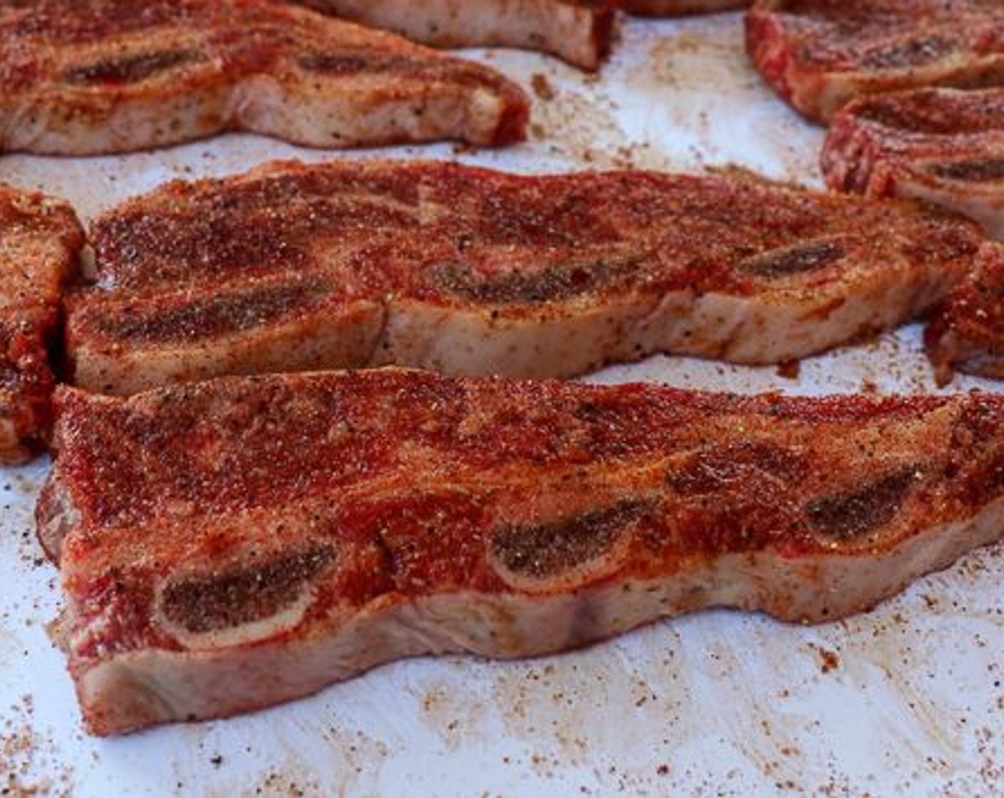 step 2 Apply generous coat of dry rub mixture to all sides of Beef Short Ribs (3 lb) and pat gently.