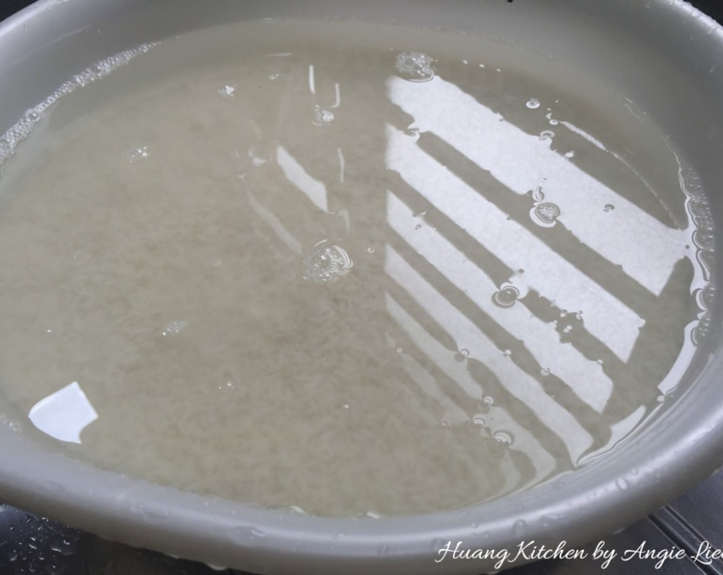 step 20 Wash and rinse the Glutinous Rice (10 1/4 cups) until water runs clear. Then soak in water for 1 hour.