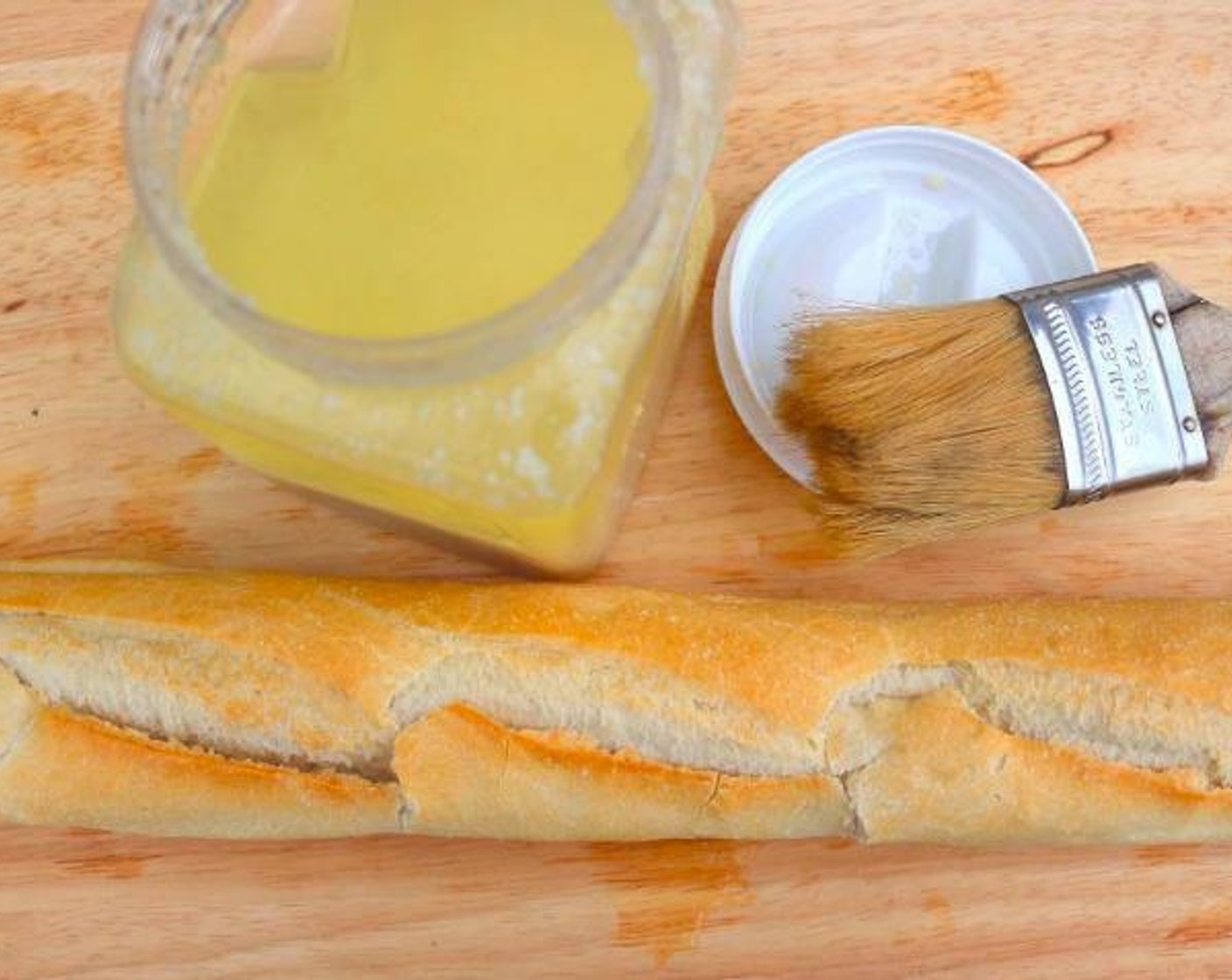 step 3 Cut a Mini French Baguettes (to taste) lengthwise into three equal slices.