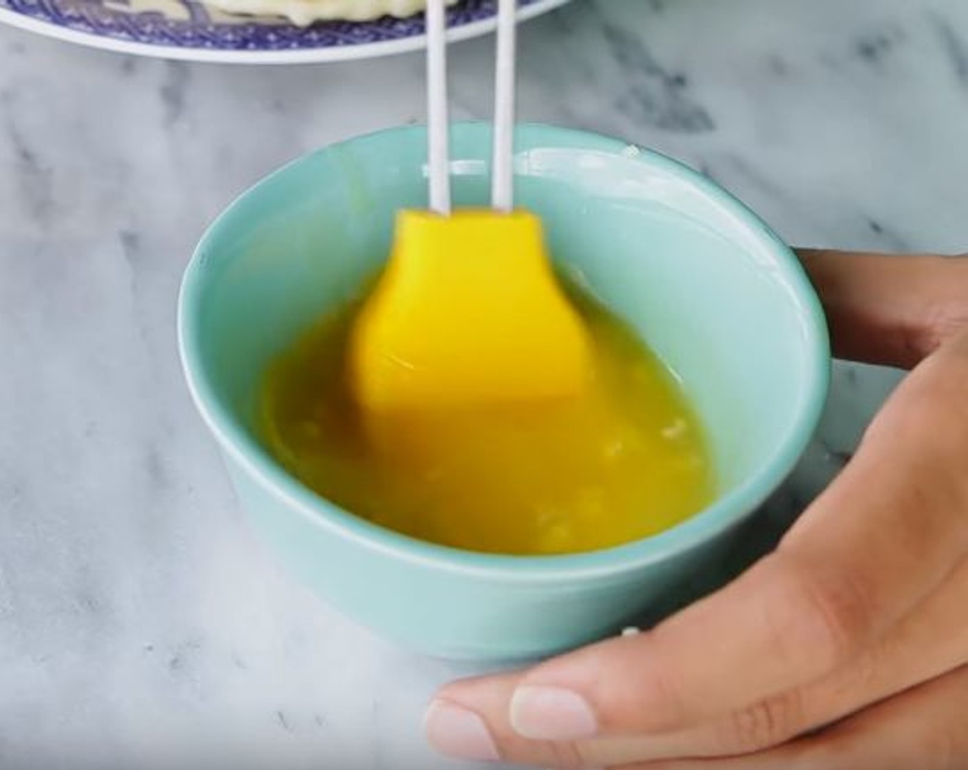 step 7 Add Garlic (1 clove) to the Butter (2 Tbsp) and brush it onto the naan. Serve as a side to a curry or as a delicious treat.