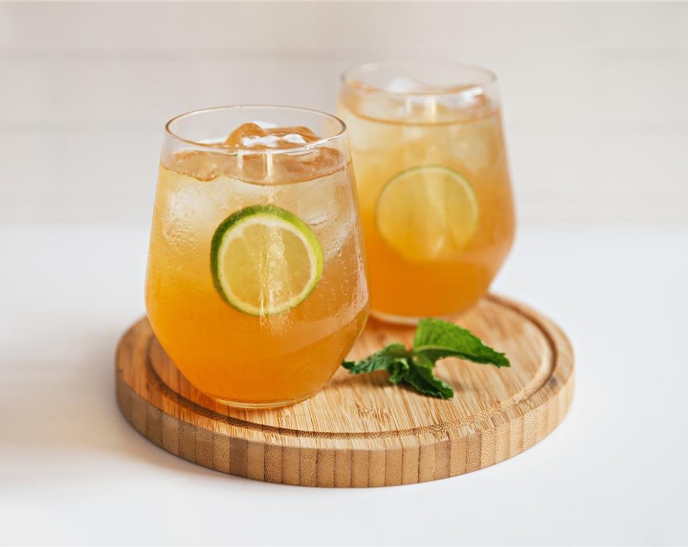 step 3 Pour Arnold Palmer into glasses filled with Ice (to taste) and garnish with Limes (to taste) and Fresh Mint (to taste).