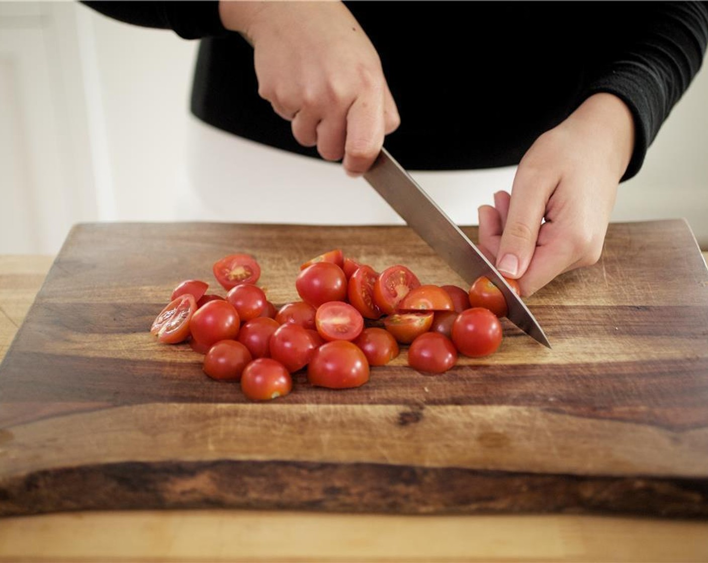 step 2 Cut Cherry Tomato (1 cup) in half lengthwise, and set aside.