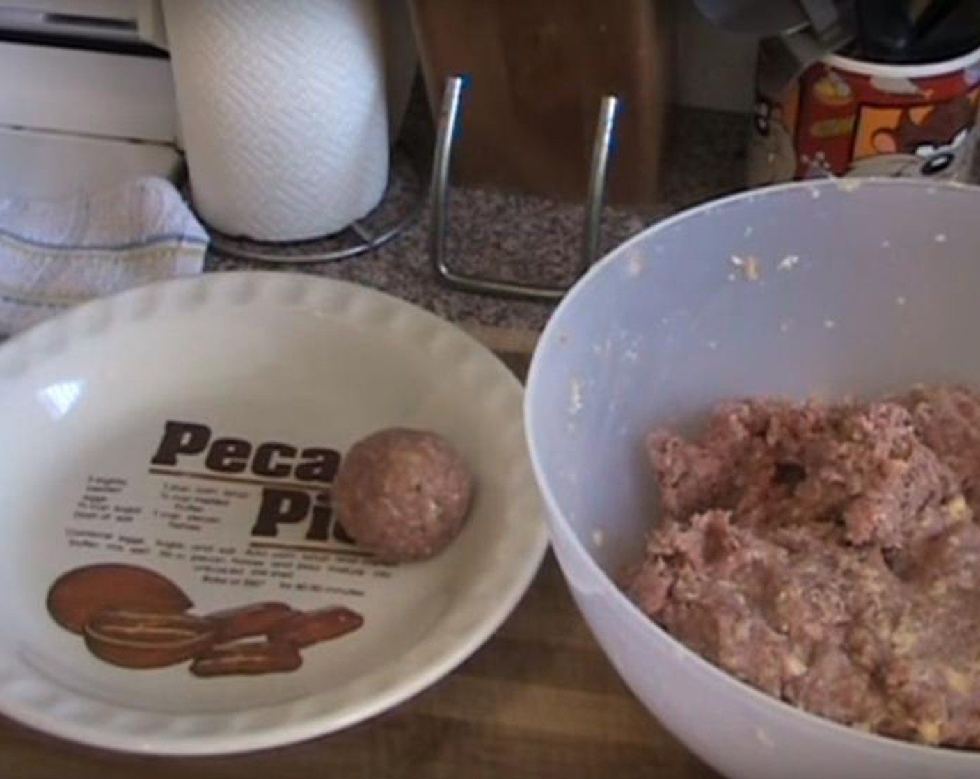 step 2 Taking small amounts of the mixture, roll the meetballs and put them on a plate. When done, put them into the fridge for 15 minutes.