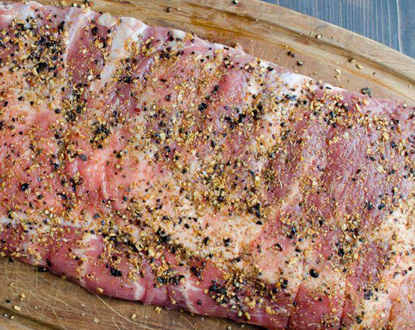 step 2 Sprinkle half of the Steak Spice Rub (1 jar) over one side of the meat and press it in with your hands. Flip the ribs over, sprinkle with the remaining rub and press it in with your hands.