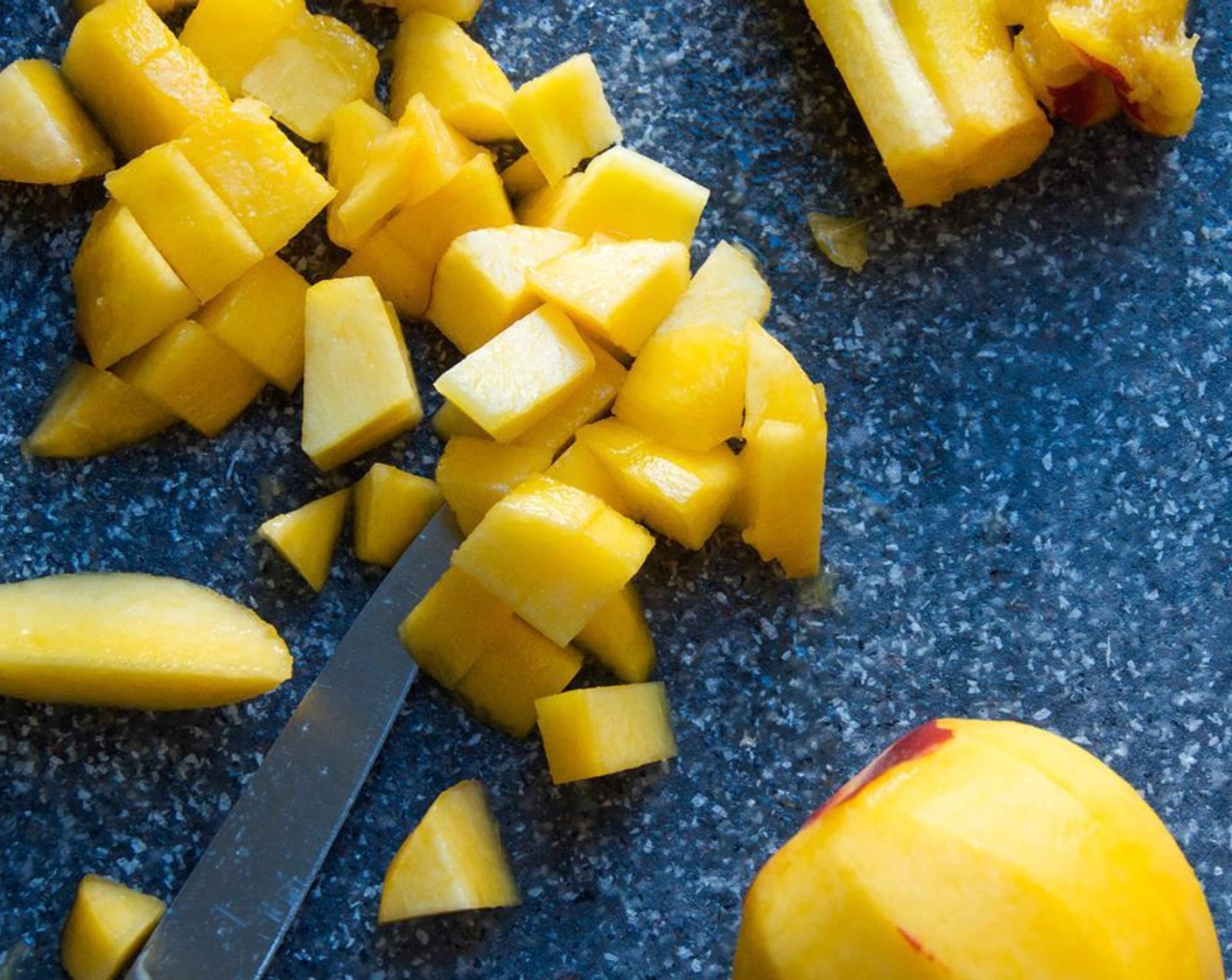 step 3 Peal the Peaches (3), remove the seed and dice them.