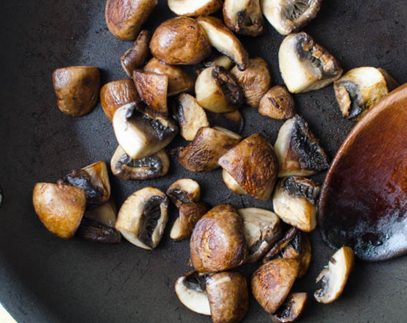 step 5 Meanwhile in a small skillet, heat the Olive Oil (1/2 Tbsp) over medium-high heat and add the Mushrooms (2 1/4 cups). Cook until browned and tender and set aside.