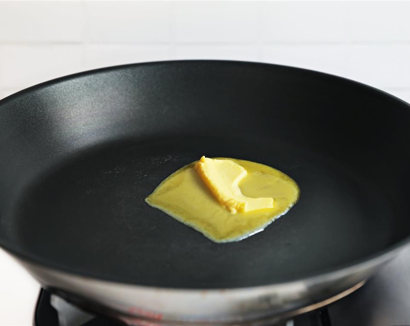 step 5 Heat a pan over medium-high heat and add Unsalted Butter (2 Tbsp).