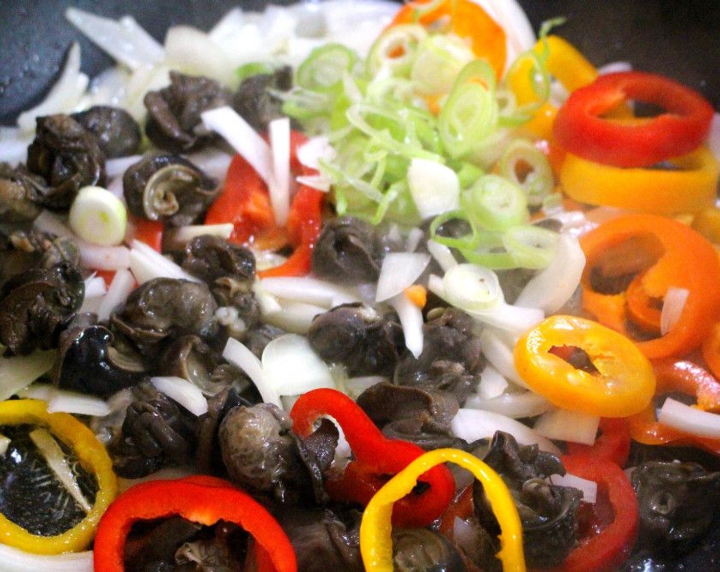 step 1 Sauté Snails (1 can), Scallions (2) Onion (1), and Chili Pepper (1/2 cup) in Extra-Virgin Olive Oil (1 1/3 cups) until the onions are translucent. Add Garlic Paste (1/2 Tbsp), sauté for another minute then add Fresh Oregano (1 Tbsp), Kosher Salt (to taste), and Crushed Red Pepper Flakes (to taste).