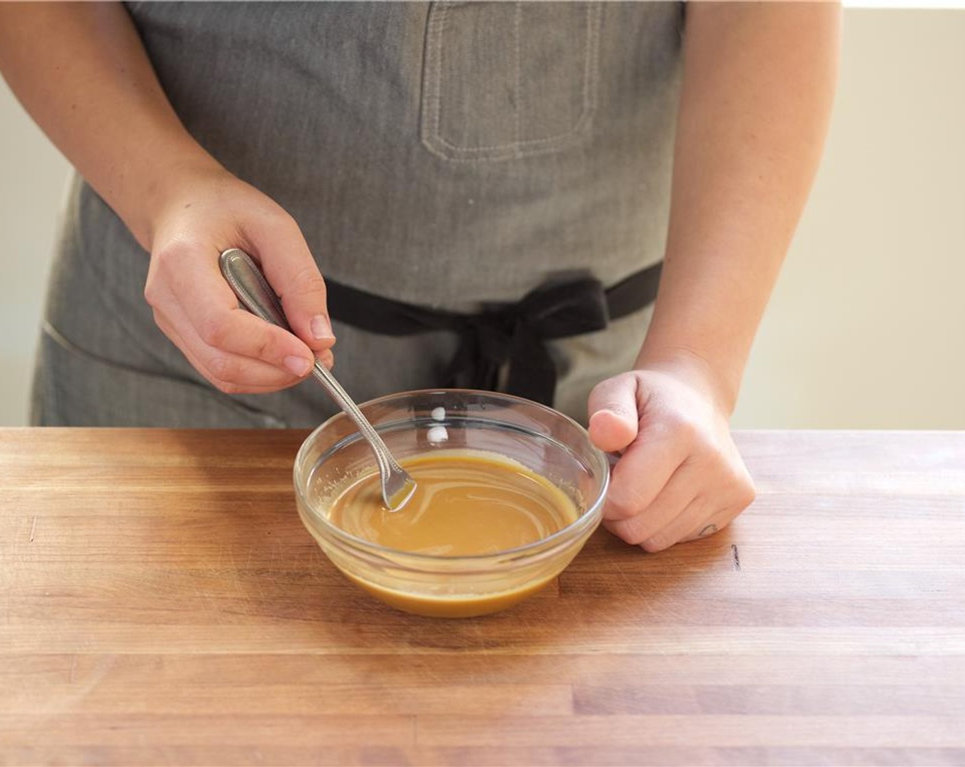 step 5 In the base of a blender, add the reduced orange juice, Tamari Soy Sauce (2 Tbsp), Black Sesame Seeds (1 Tbsp), Chili Oil (2 Tbsp), Granulated Sugar (2 Tbsp), and Rice Vinegar (2 Tbsp). Blend until emulsified and set aside.