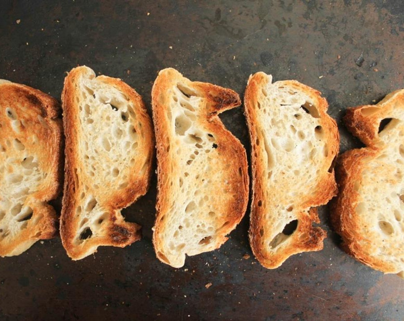 step 4 Arrange the bread on a baking sheet and broil for 1-2 minutes per side until nice and toasty.