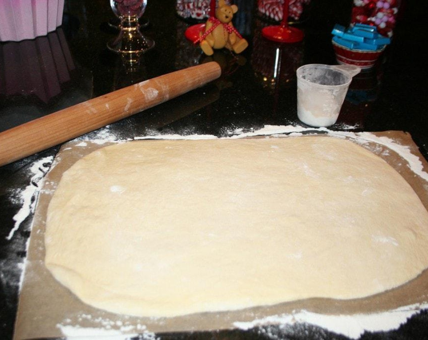 step 4 Once the dough cycle is complete. Flour surface and roll out dough in a rectangle about 18 by 9 or around that.