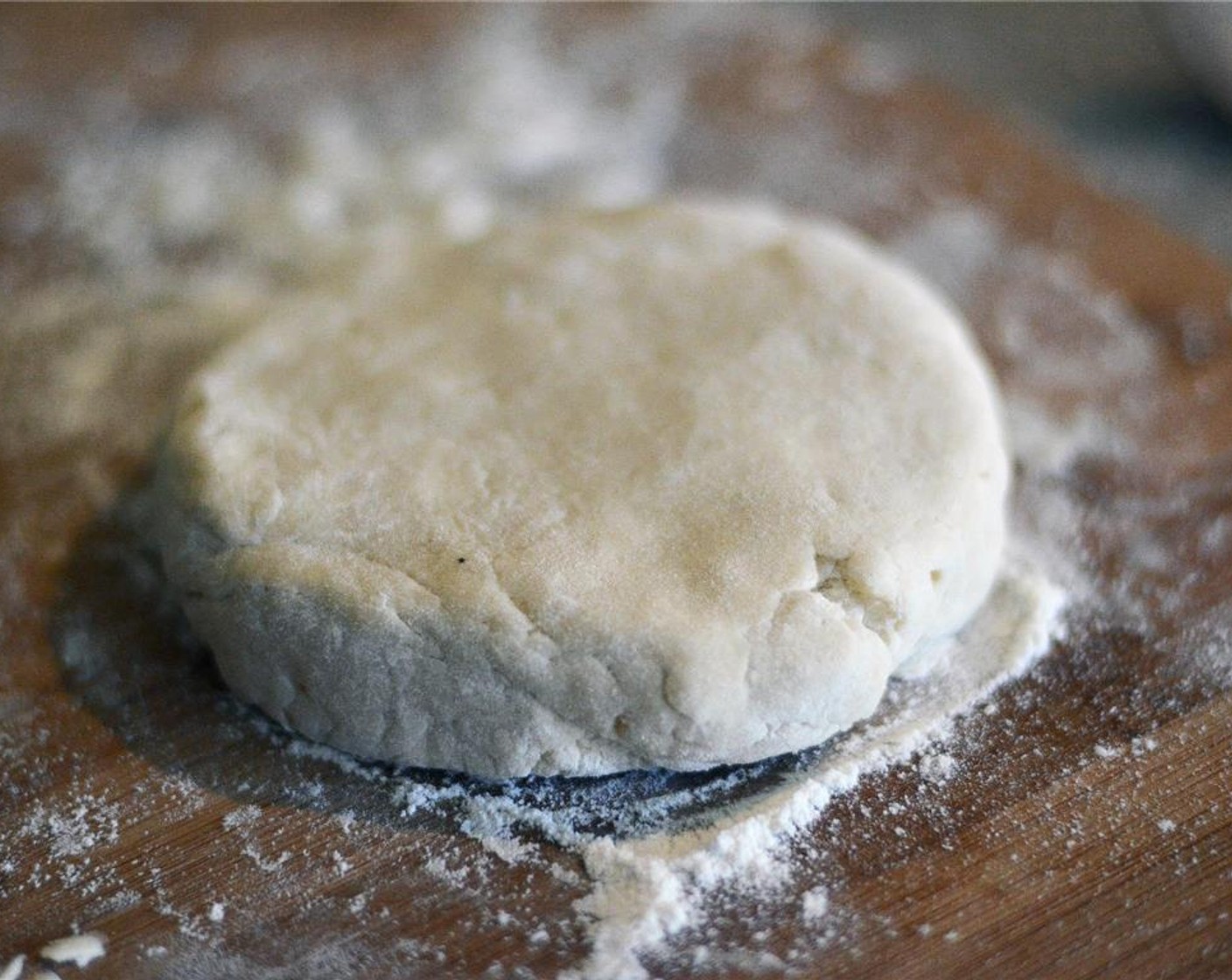 step 4 Turn the dough out onto a lightly floured surface and shape in a round, flat disk. Wrap in plastic wrap and refrigerate for at least 1 hour before using.