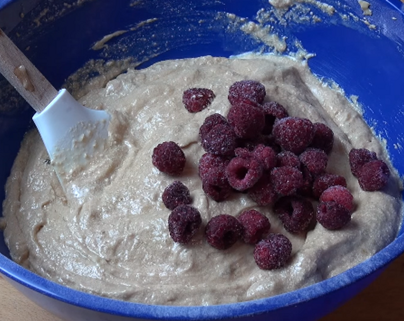 step 2 Add Self-Rising Flour (2 cups), Baking Powder (1 tsp), and Ground Cinnamon (1 tsp). Beat together. Stir in Milk (1/2 cup), fold in frozen Fresh Raspberry (1/2 cup).