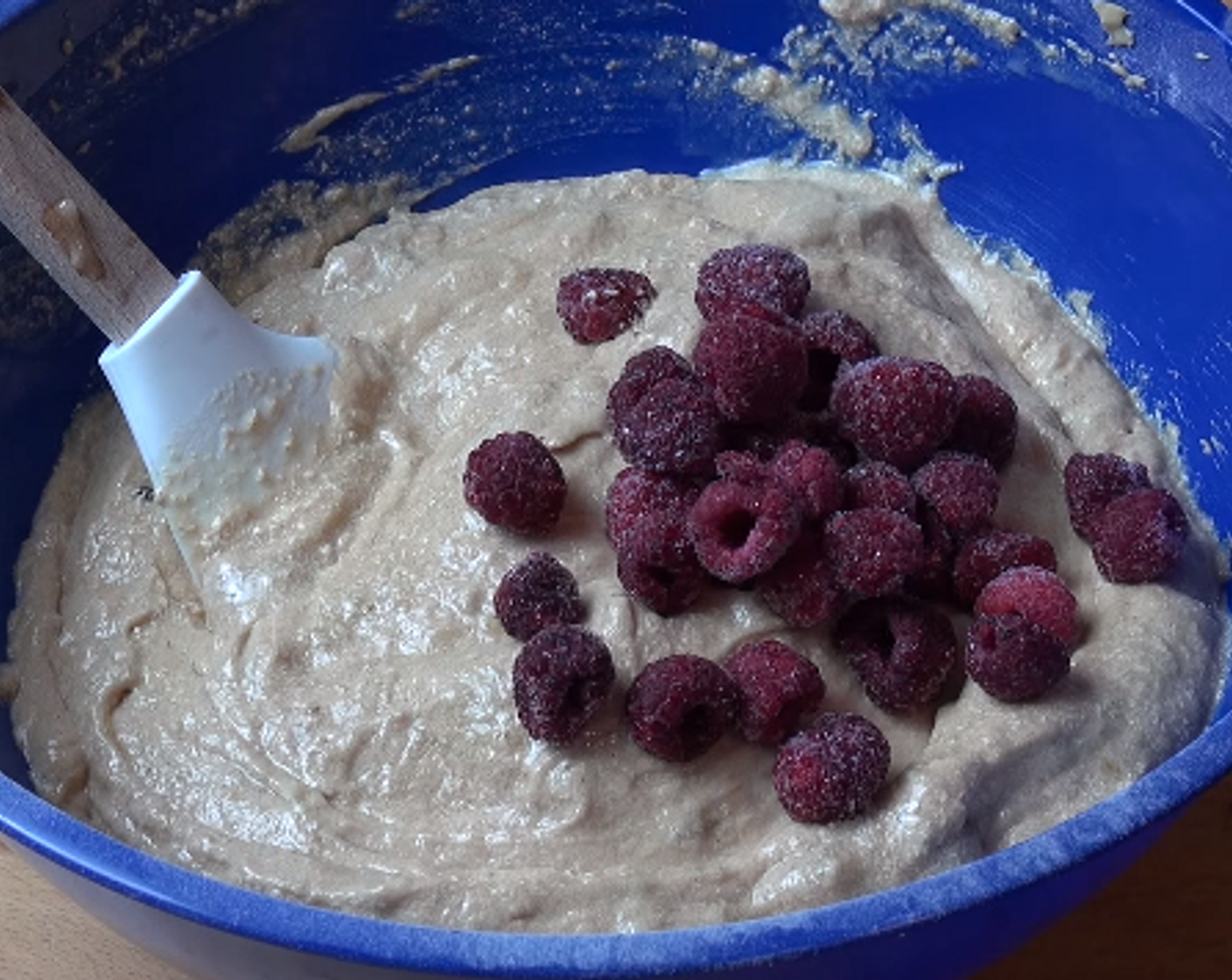 step 2 Add Self-Rising Flour (2 cups), Baking Powder (1 tsp), and Simply Organic Cinnamon, Ground (1 tsp). Beat together. Stir in Milk (1/2 cup), fold in frozen Fresh Raspberry (1/2 cup).