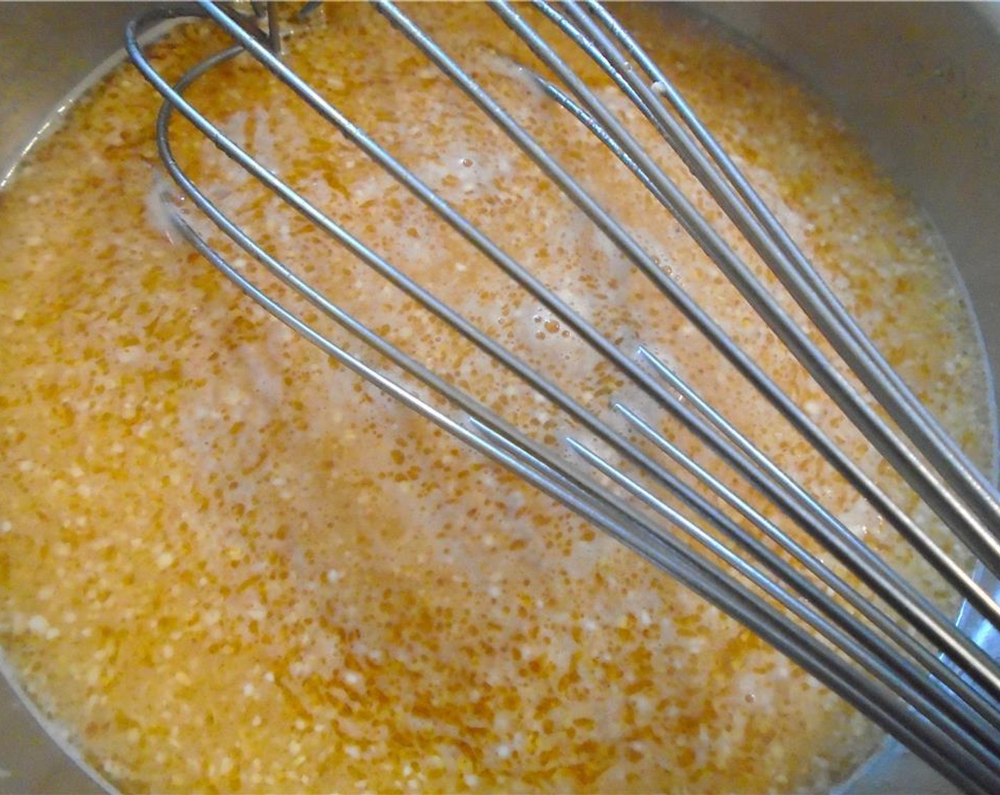 step 2 Add Coarse Cornmeal (1 1/2 cups) and simmer until cornmeal is soft, about 40 minutes.
