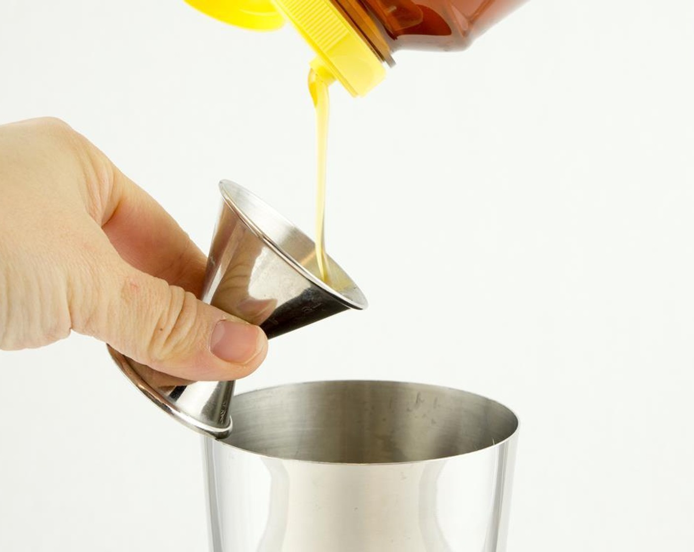 step 3 Add the Honey (2 tsp) and Apple Juice (0.5 fl oz) into the shaker.
