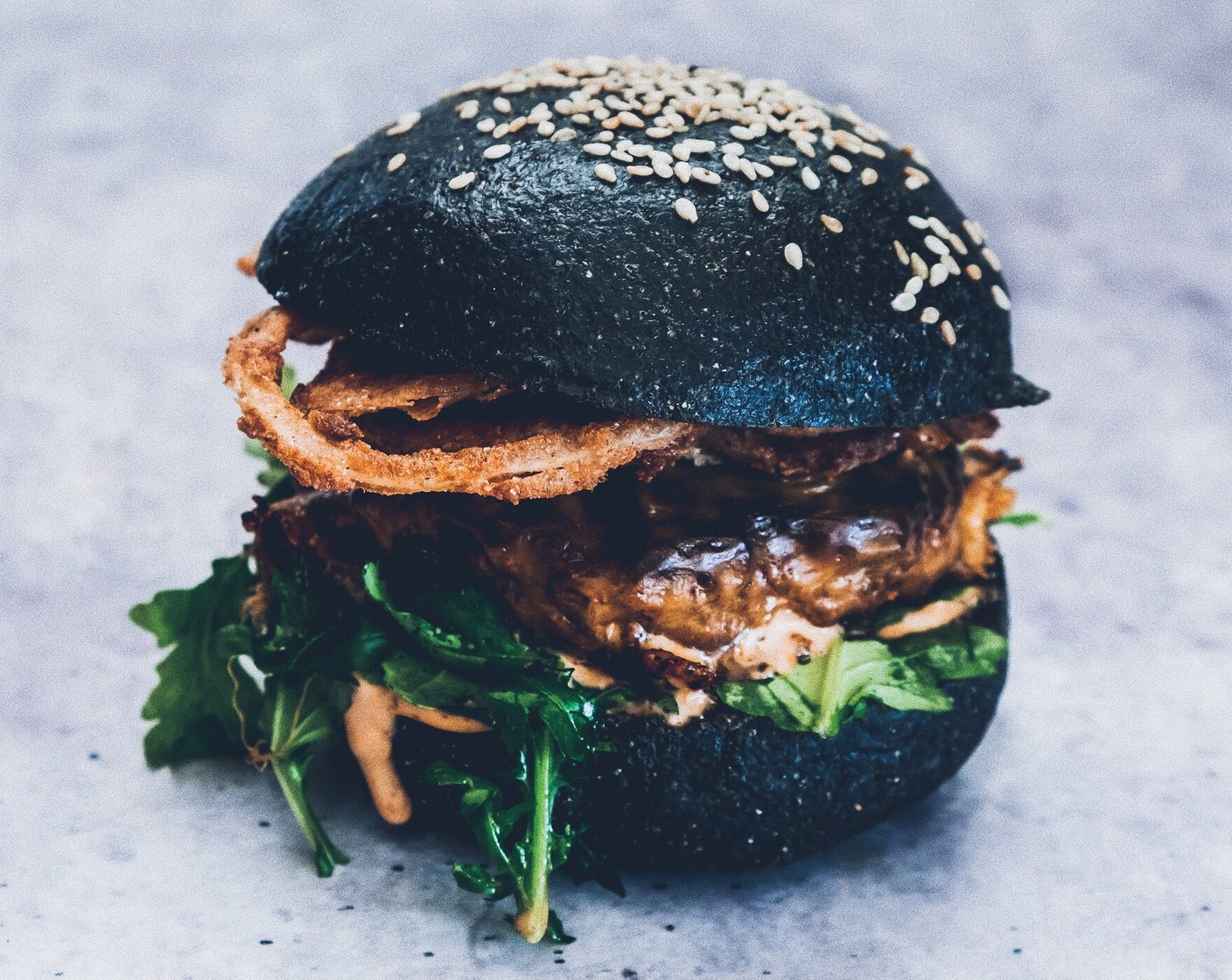 Crispy Onions and Arugula Burger