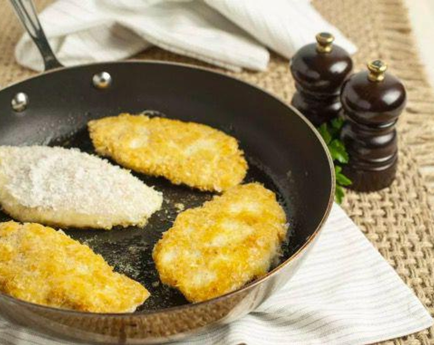 step 4 Dunk one fish fillet into eggs to coat evenly, then place into potato flakes. Flip to coat evenly on both sides. Add to hot pan and repeat with remaining fish fillets. Pan fry for 2-3 minutes on each side, or until golden.