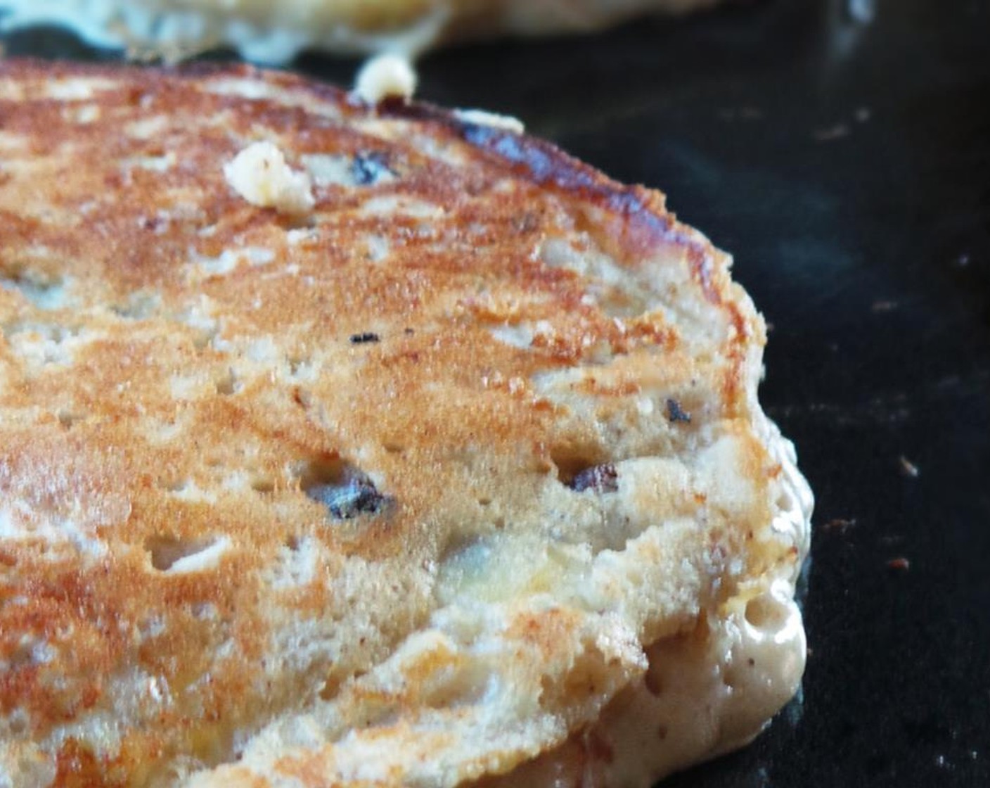 step 3 Heat a griddle or pan to medium heat. Spray with cooking spray. Once hot, add a quarter cup of batter and cook two minutes on each side until browned.