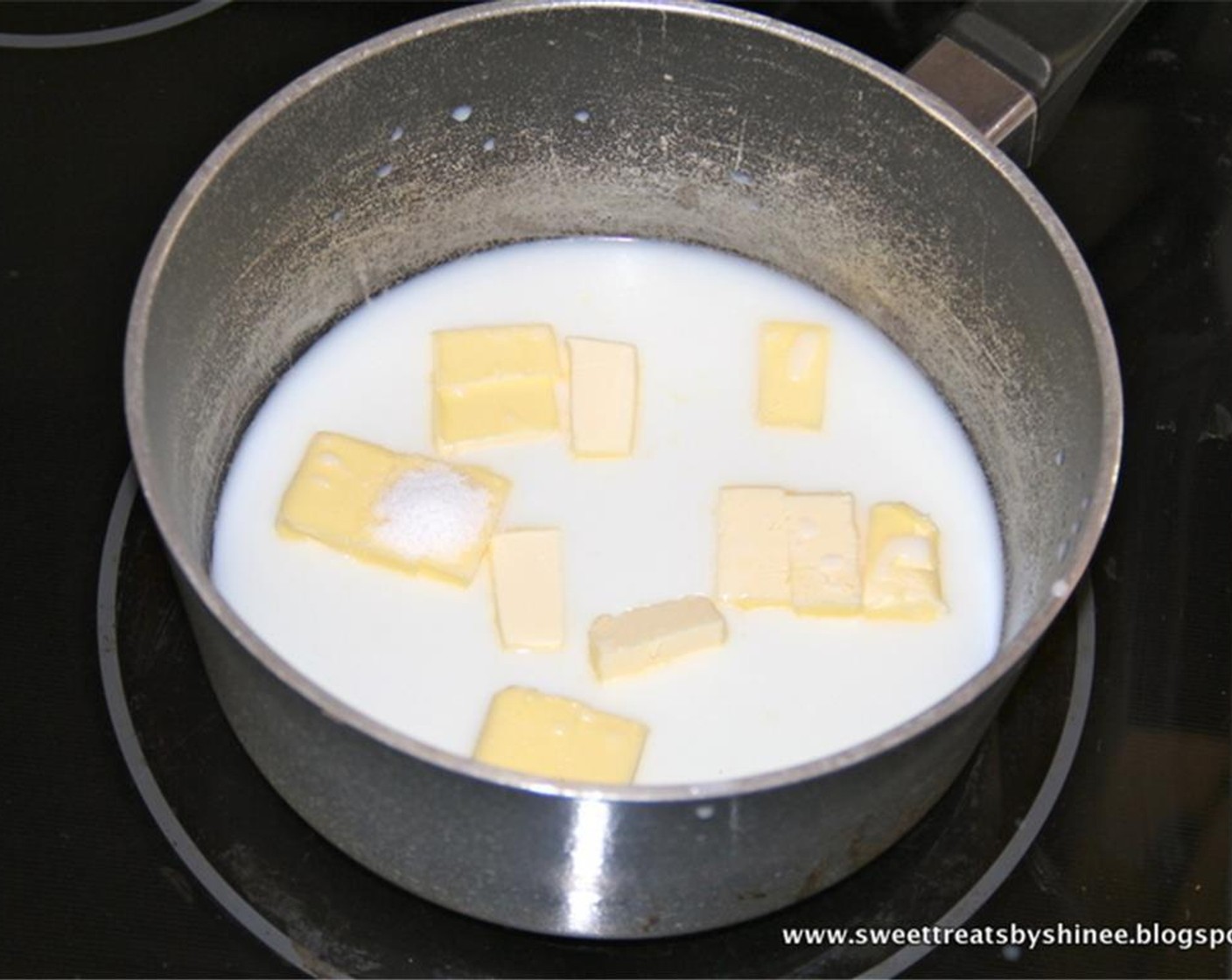 step 2 In a medium saucepan, combine Water (1 cup), Unsalted Butter (1/2 cup), Granulated Sugar (1 Tbsp), and Salt (1/4 tsp). Slowly heat the mixture over medium heat, stirring frequently to dissolve sugar and melt the butter. Once sugar is dissolved and butter is melted, increase the heat to medium-high heat and bring the mixture to a boil.