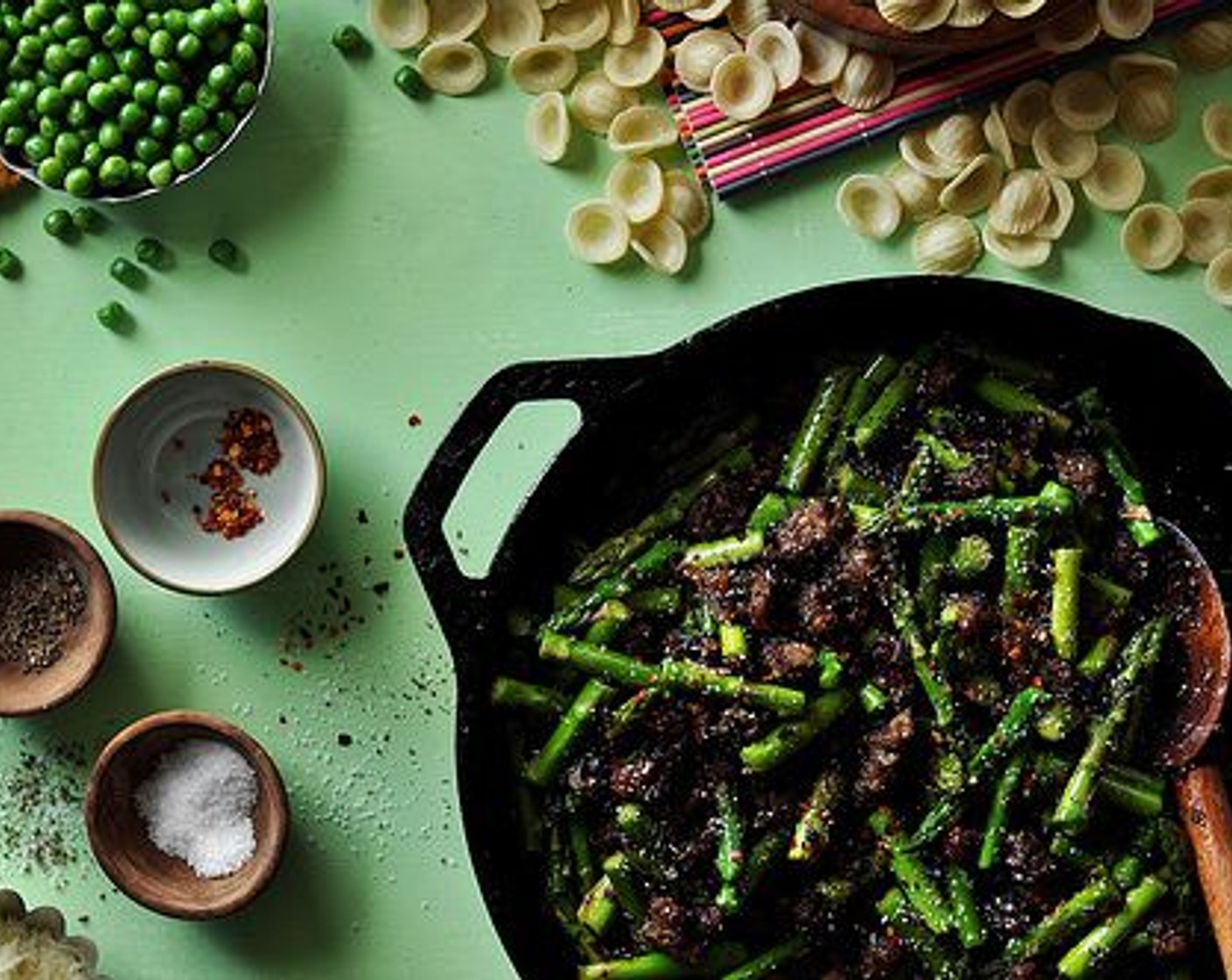 step 7 Add the minced shallot and garlic and cook for a few more minutes. Stir in the chopped asparagus and season with Salt (to taste), Ground Black Pepper (to taste), and Crushed Red Pepper Flakes (1/2 tsp).