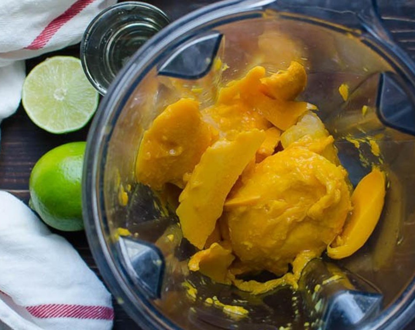 step 1 Scoop the Mangoes (3) and Fresh Pineapple Chunks (2 cups) into a blender. Add the Corn Syrup (1/2 cup) and Lime (1) and blend until smooth, about 30 seconds.