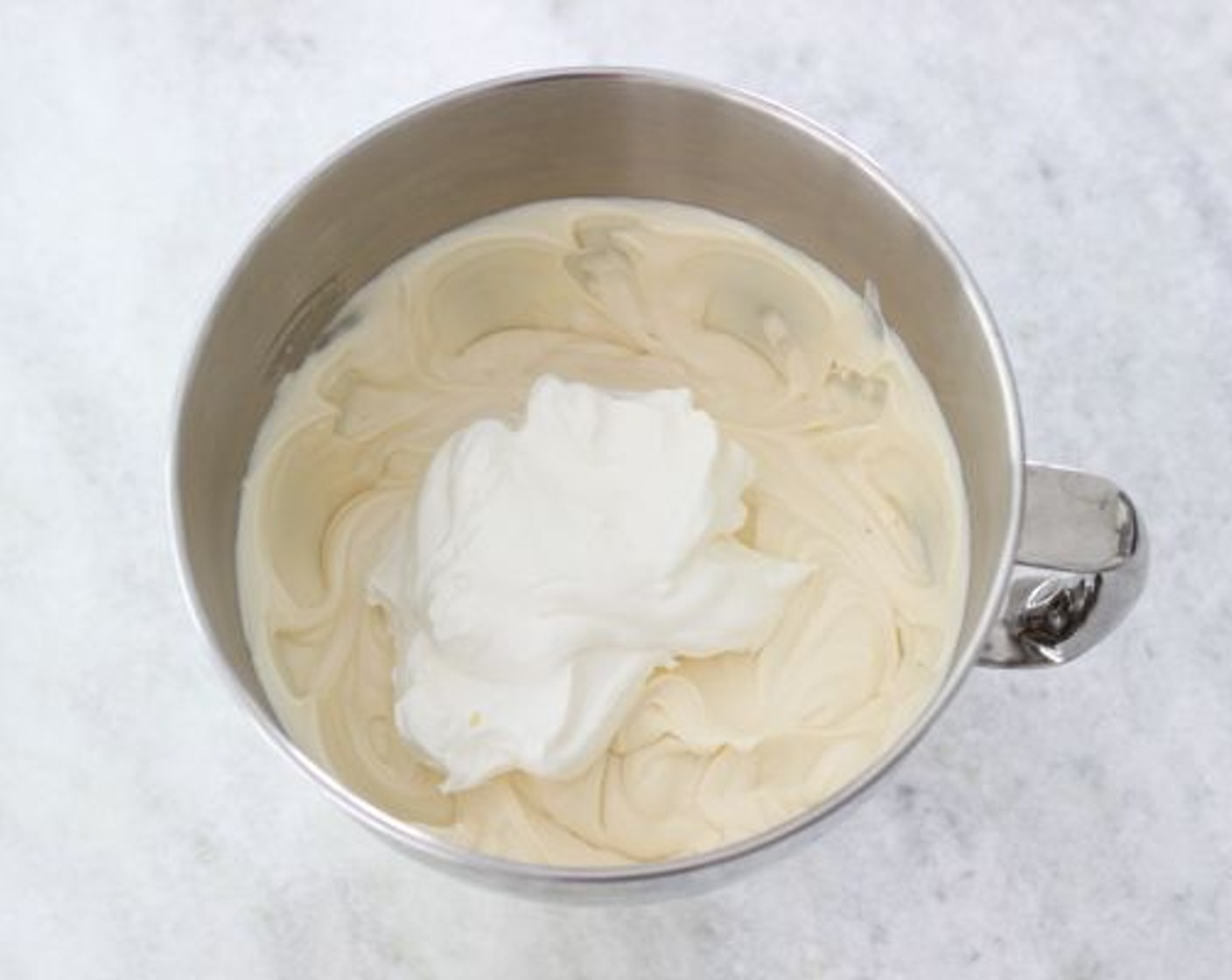 step 9 Add the Sweetened Condensed Milk (1 can). Mix to combine. Add the Sour Cream (1 tub) and Vanilla Extract (1/2 Tbsp) and also mix to combine.