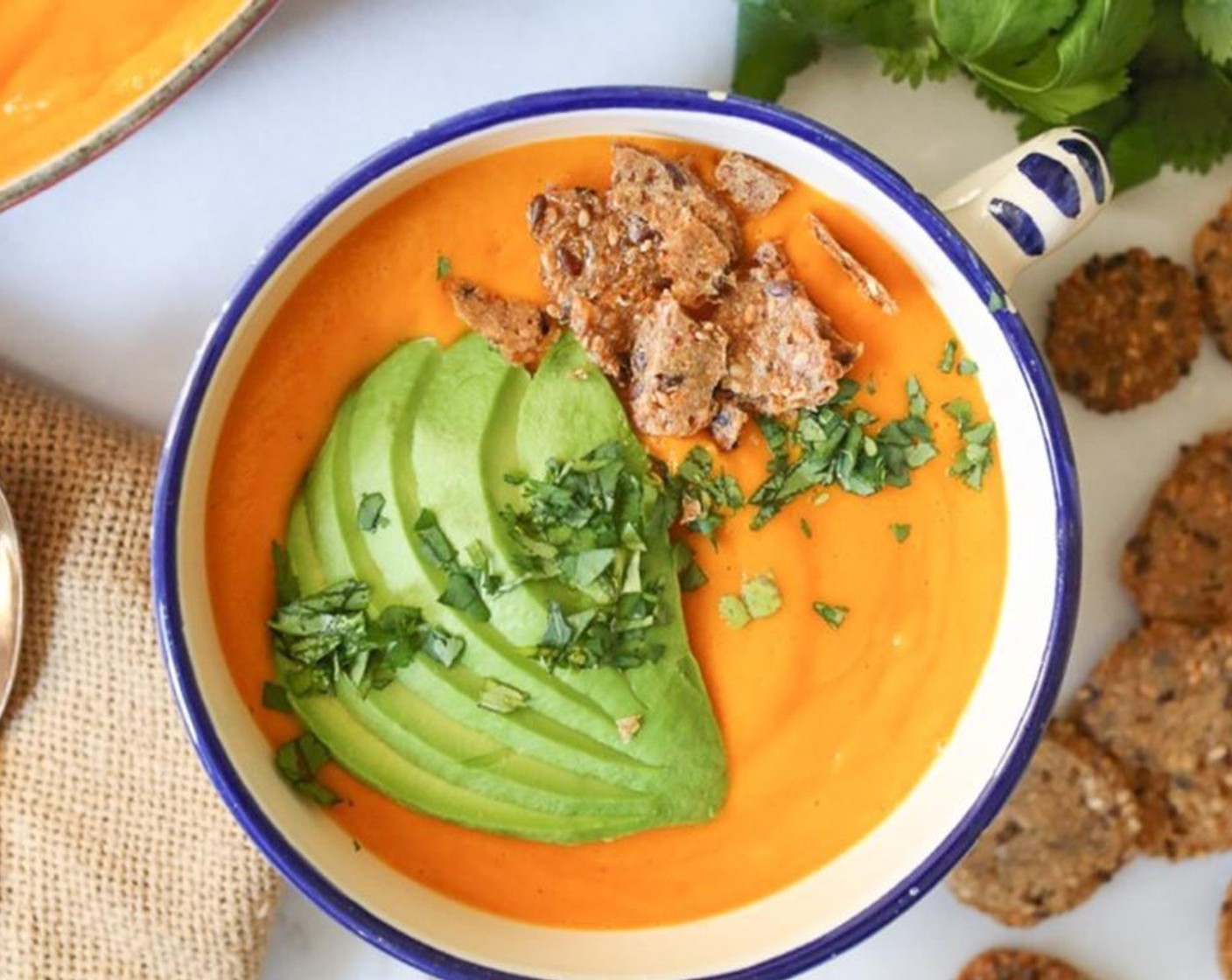 step 6 Ladle soup into bowls and garnish with Avocados (to taste), Fresh Cilantro (to taste), and Crackers (to taste).