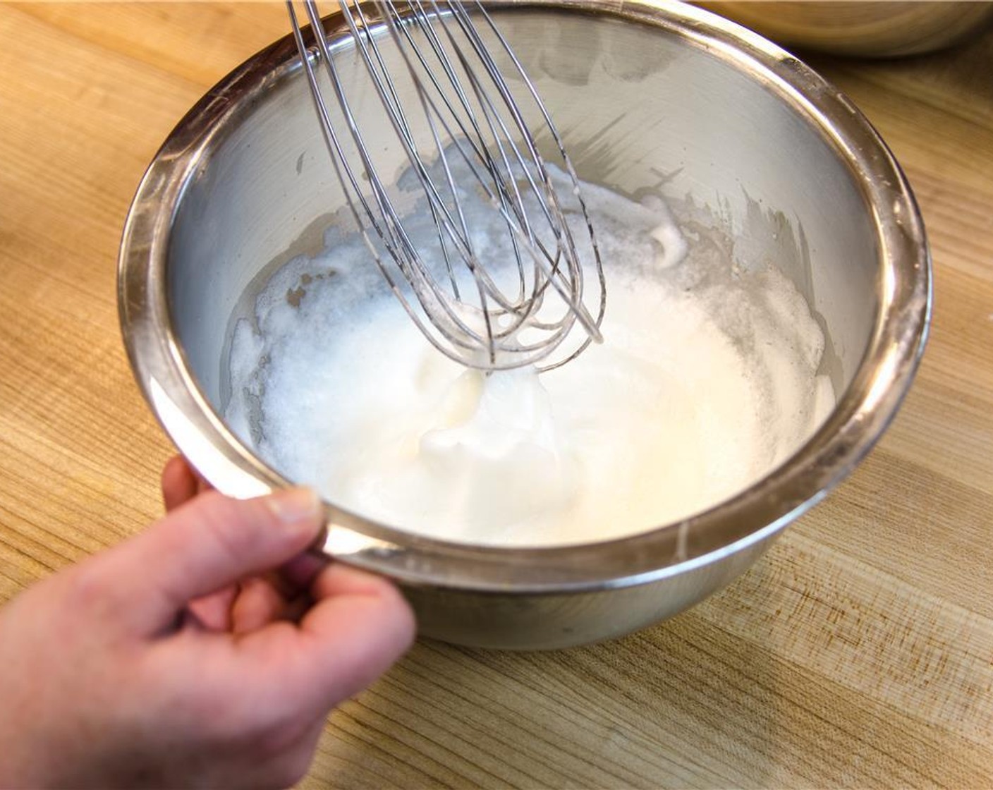 step 6 In a separate bowl with a clean whisk, whisk the whites until stiff but not dry.