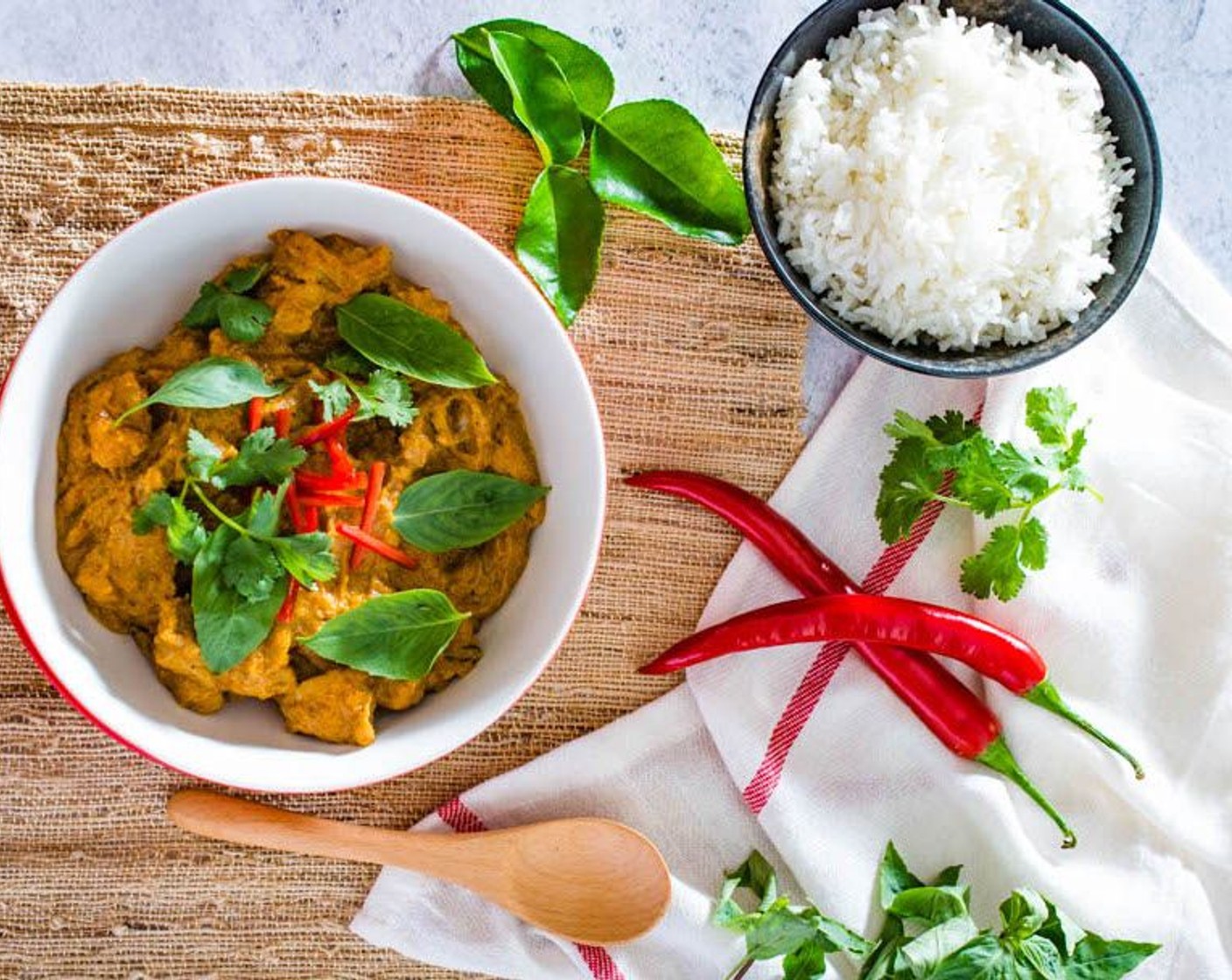step 9 Transfer the curry into a bowl, then garnish with fresh sliced Red Chili Pepper (1), Fresh Cilantro Leaf (1/2 cup) and Fresh Thai Basil Leaves (1 cup). Serve with steamed rice. Enjoy!