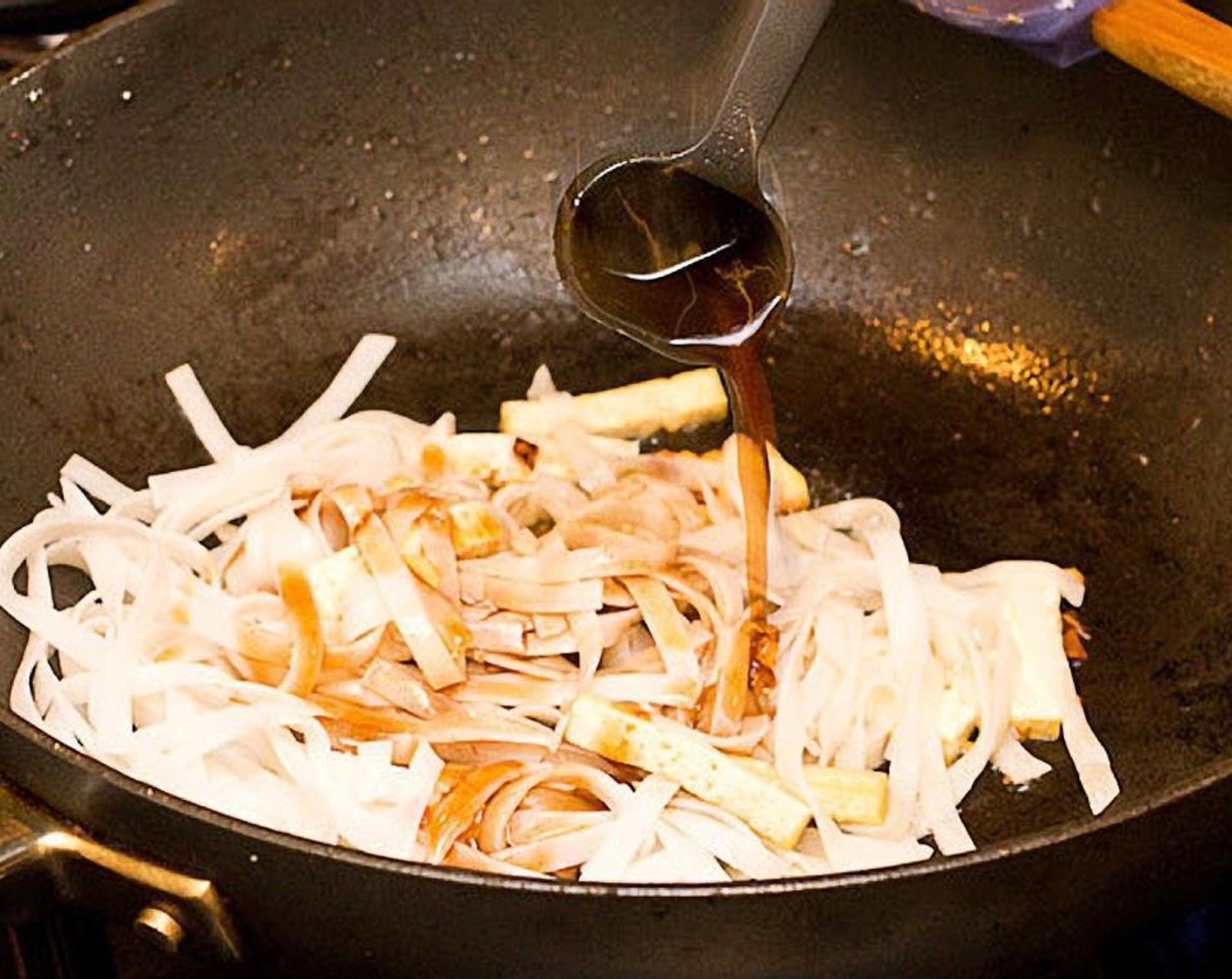 step 5 For the sauce, heat a small pot on medium. Mix Tamarind Concentrate (4 Tbsp), Palm Sugar (1 cup), Fish Sauce (4 Tbsp), Water (4 Tbsp) and Ground Chili Pepper (1 tsp). Stir and crush palm sugar until fully dissolved and turn off heat.