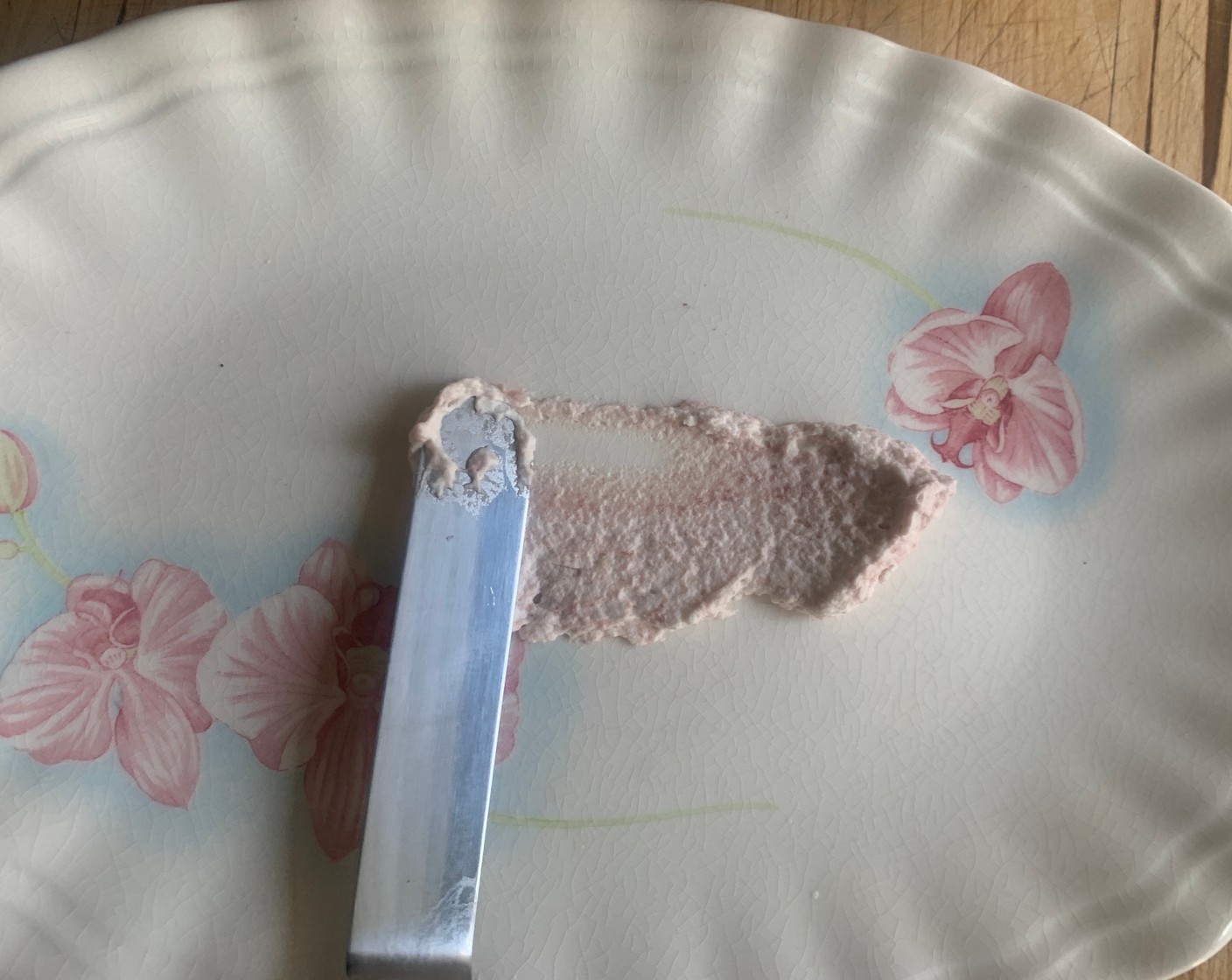 step 3 Using the plate you’ll want to serve on, spread some of the whipped cream mixture on the bottom. This is to help steady the wafers as you stack lengthwise.