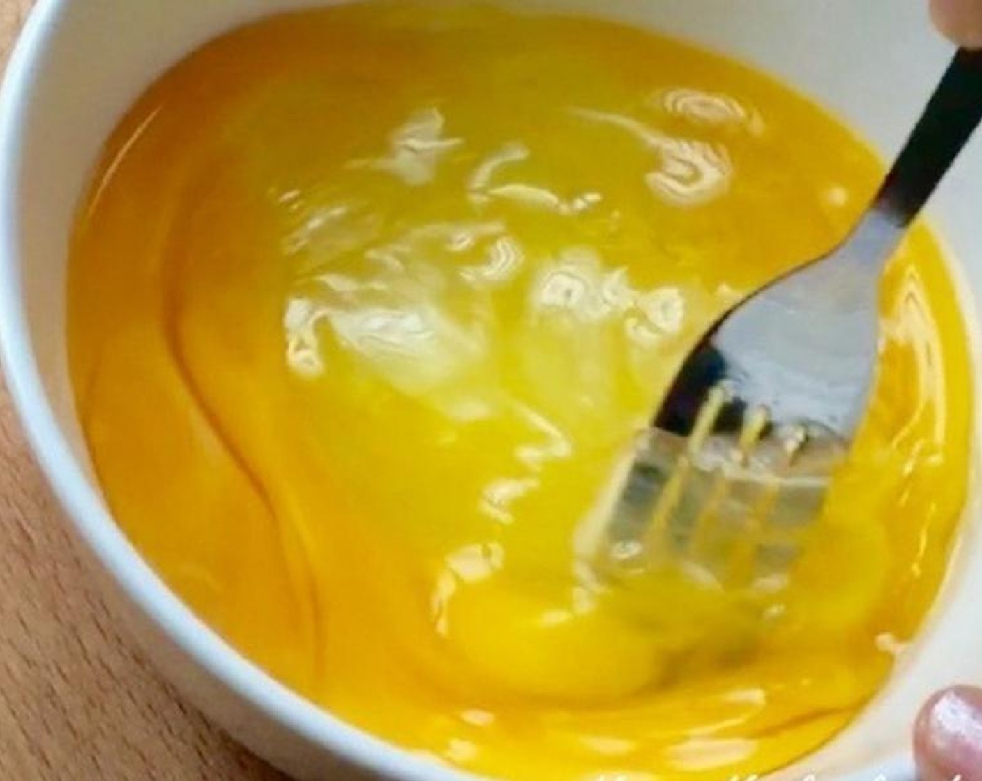 step 2 Beat Eggland's Best Classic Eggs (3) in a bowl.