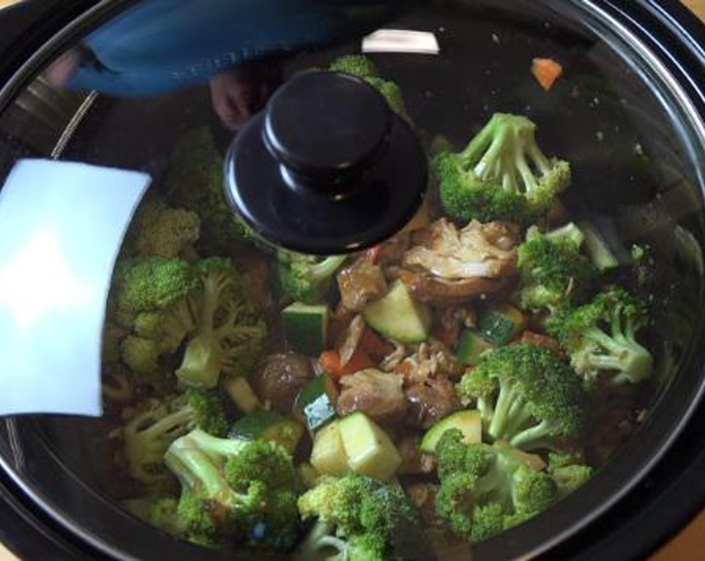 step 3 After 4 hours, mix together the Corn Flour (2 Tbsp) and Water (1/2 cup), and pour the mixture into the pot. Also add and stir through the Broccoli (1 head), Zucchini (1), and Carrot (1). Put the lid on and cook the mixture for additional 30 minutes.