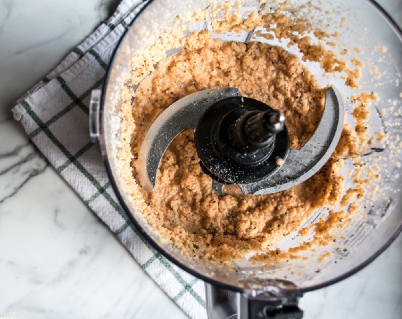 step 7 Add Water (1/2 cup), Garlic (1 clove), Dried Basil (1/2 tsp), Fresh Oregano (1/2 tsp), Sea Salt (1/4 tsp) and Baking Powder (1/2 tsp), and process 20-30 seconds or until a smooth consistency is reached.