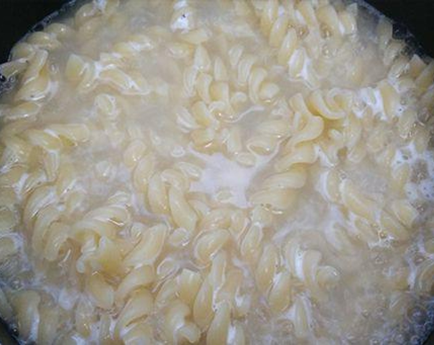step 1 Boil water enough to cover pasta. Add some Salt (to taste) and Olive Oil (1 Tbsp) and add the Rotini Pasta (7 oz). Cook well, but do not overcook the pasta.