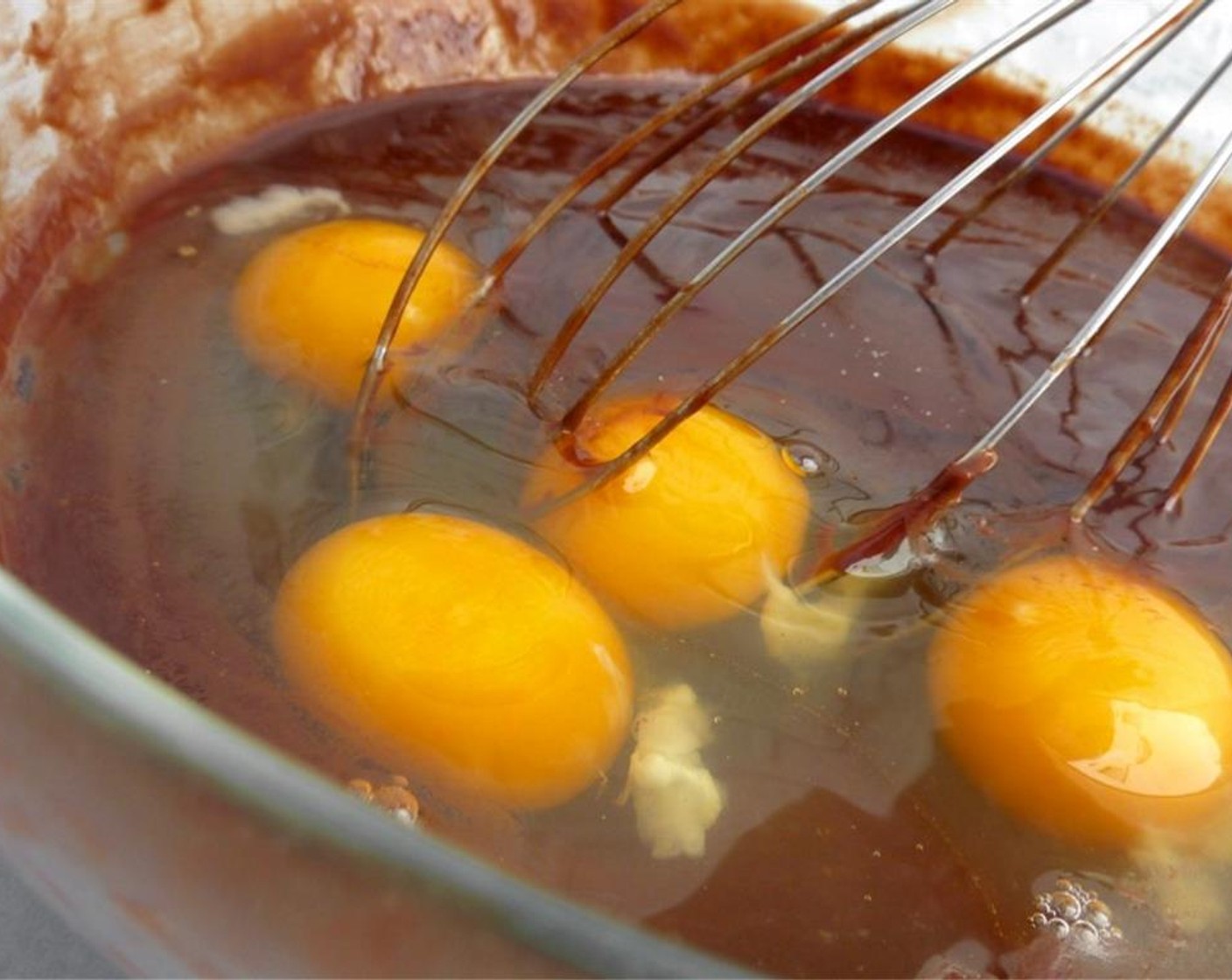 step 5 Crack the Eggs (4) and add them to the chocolate mixture.