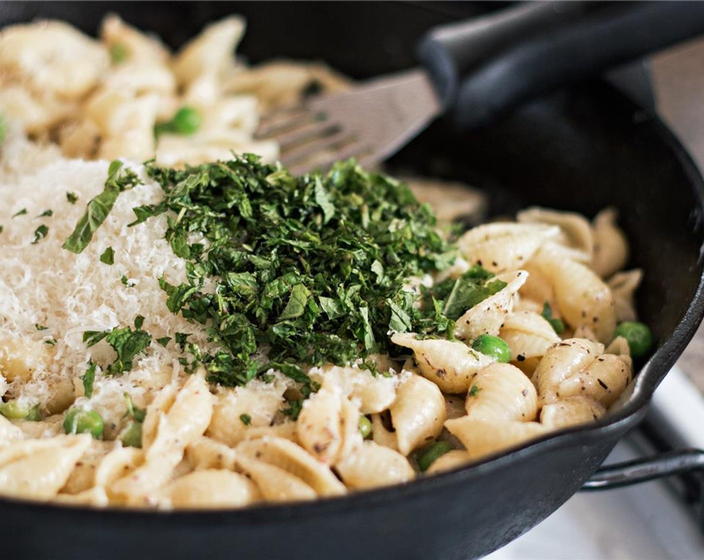 step 11 Gently toss pasta, sauce, mint, Parmesan Cheese (1/2 cup) and bacon together. Adjust seasoning to taste with extra Salt (to taste) and Ground Black Pepper (to taste).