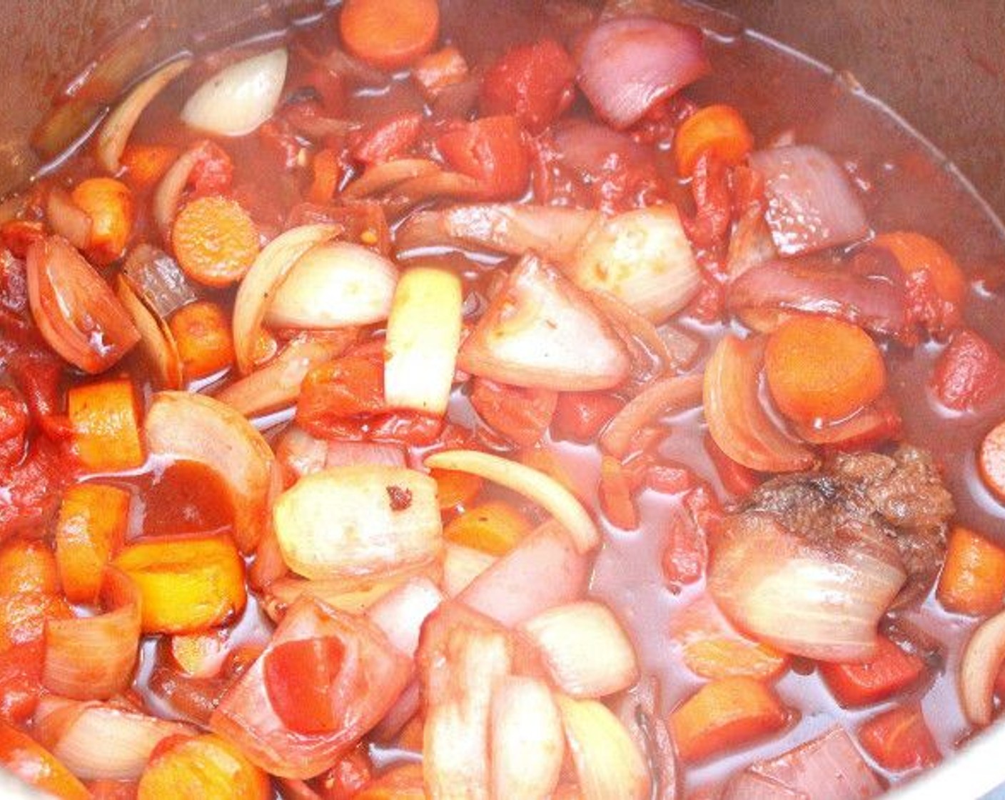 step 2 In the same pot, sauté Carrots (2 cups) and the Onions (2) until lightly caramelized. Add Tomatoes (2 cups), 2 cups of Merlot (2 cups) and Beef Stock (32 fl oz).