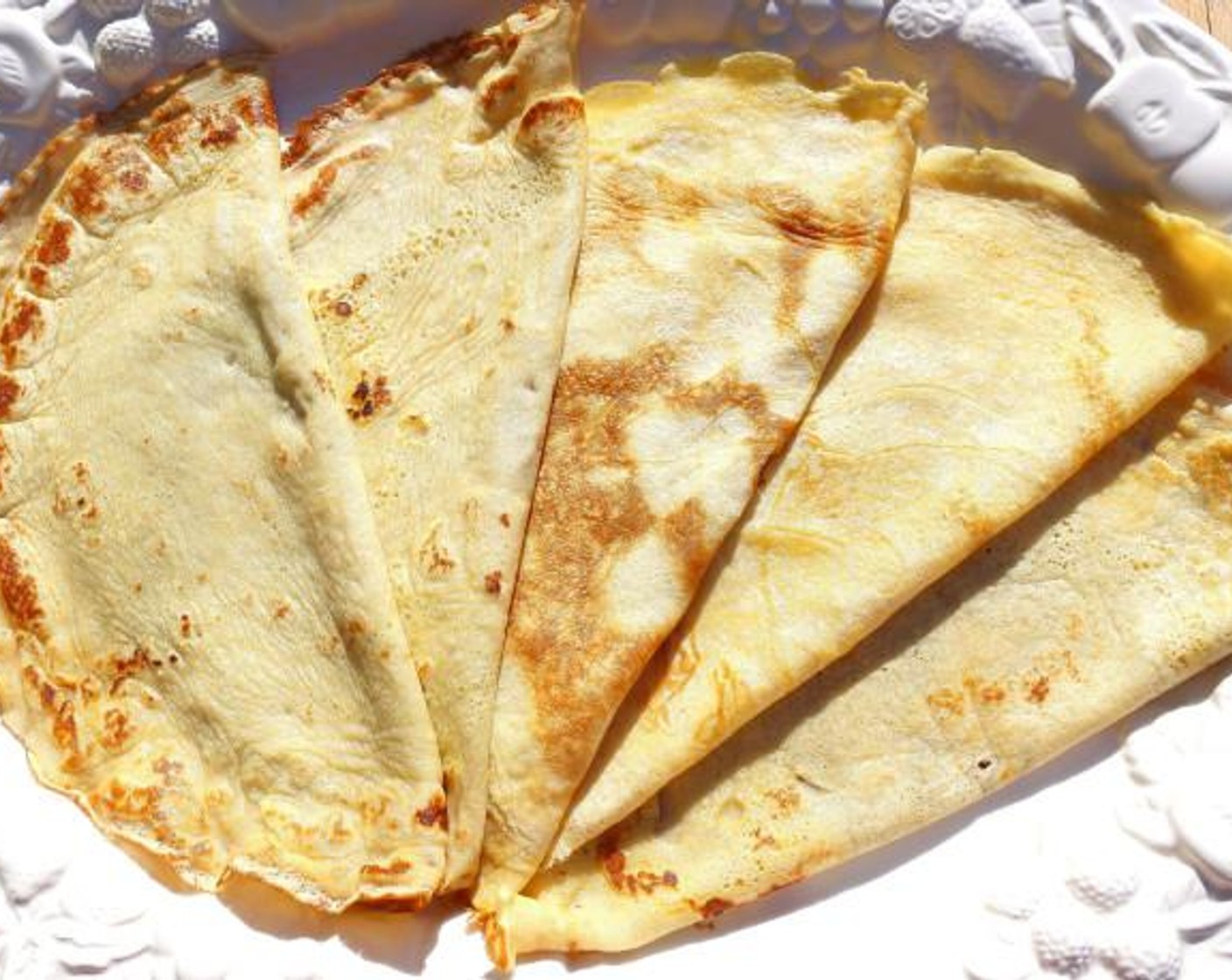 step 6 Remove crepe to a warm platter, fold crepe in half, and repeat  with the rest of the batter.