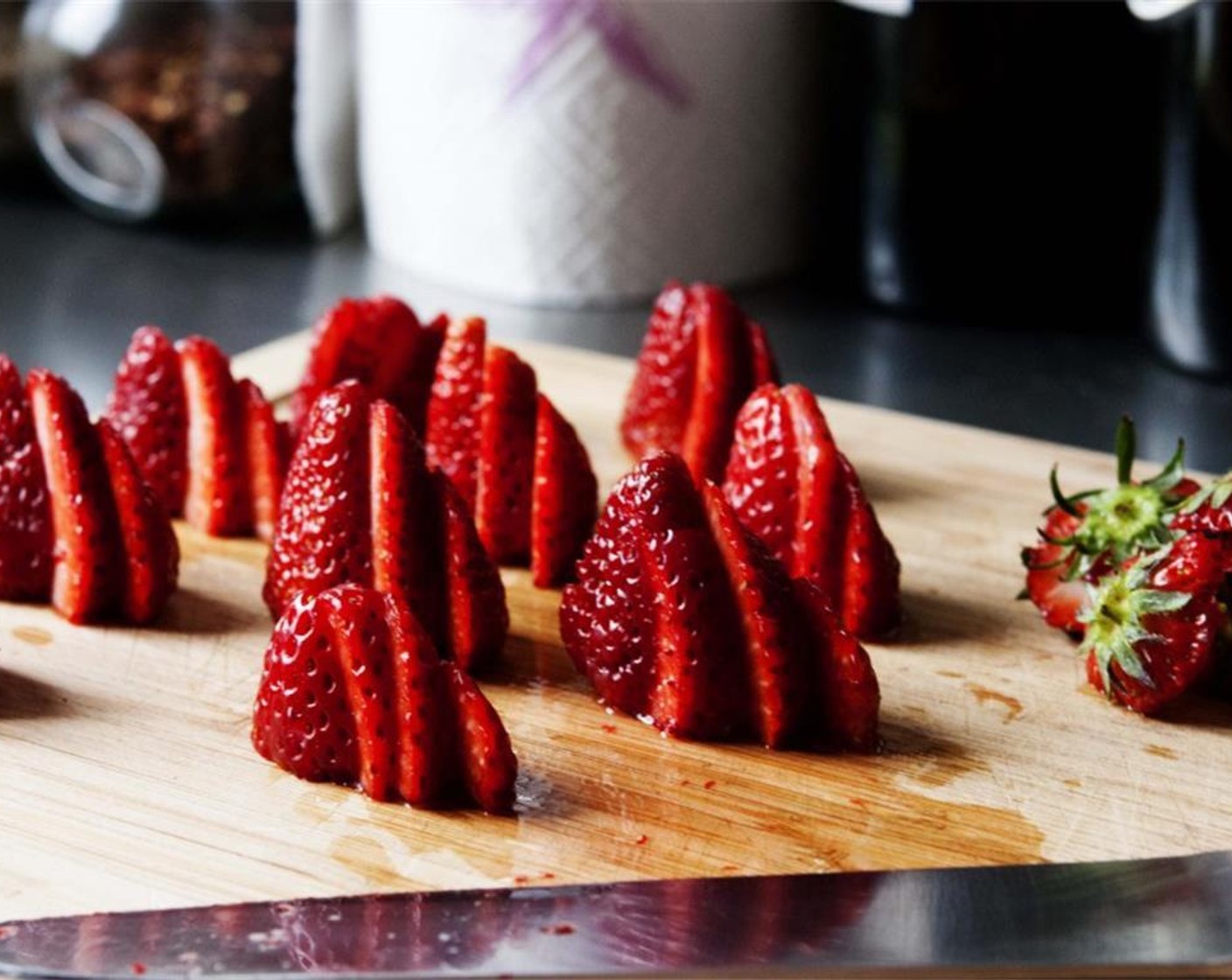 step 11 While the crust is baking, wash and slice the strawberries.