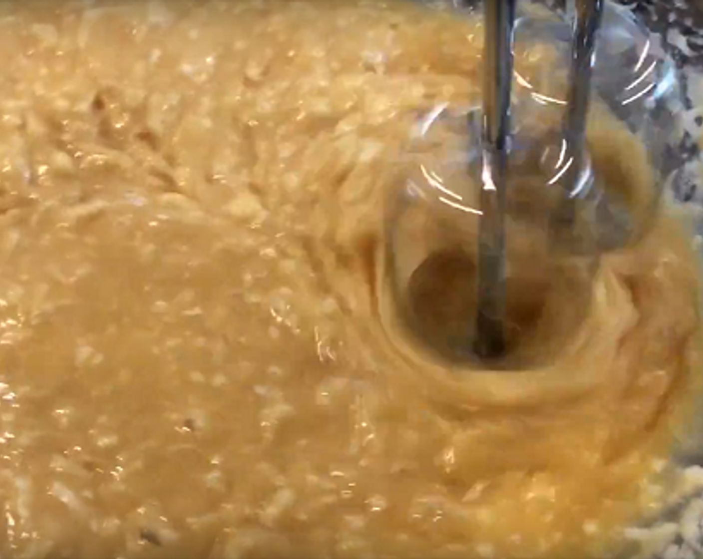 step 3 Slowly pour in Butter (1 stick), and add in Salt (1 pinch). Mix until combined, then stir in the Unsweetened Coconut Flakes (1 1/4 cups).