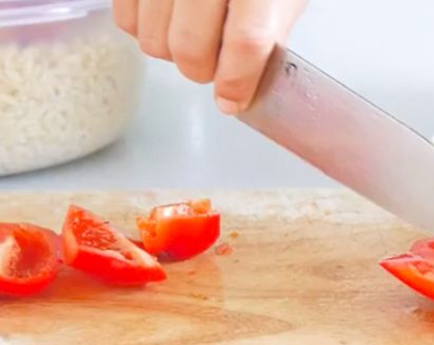 step 2 Chop and deseed the Roma Tomatoes (2), Cucumber (1), and Red Chili Pepper (1).