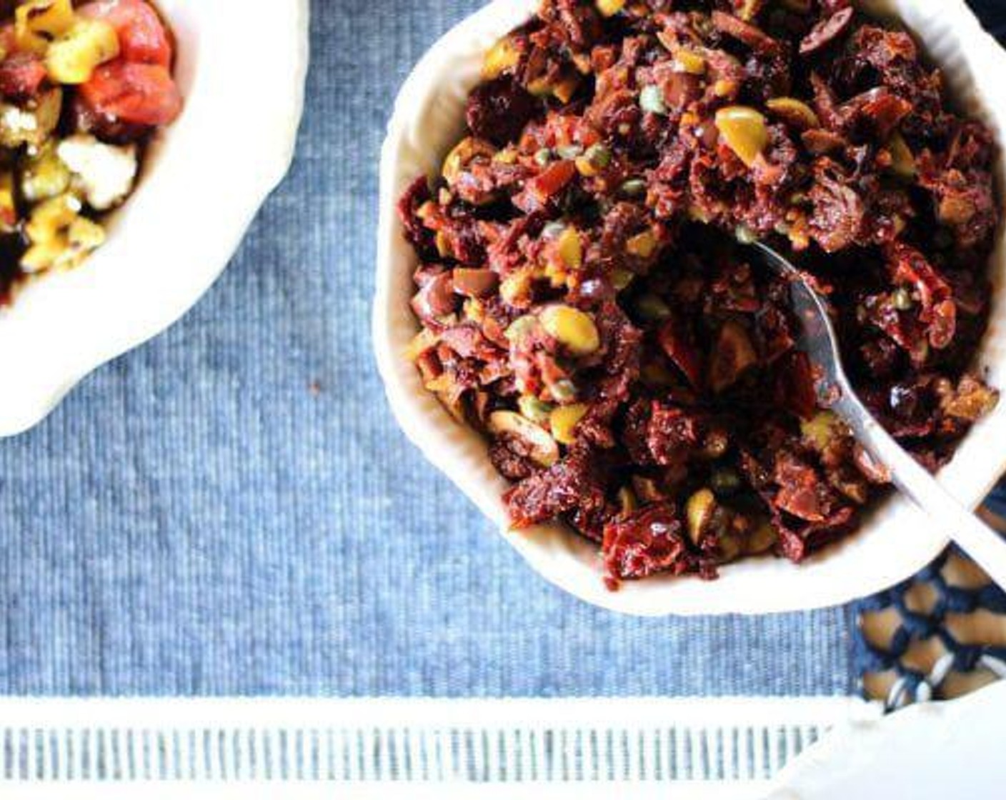 step 5 Combine Garlic (2 tsp), Sun-Dried Tomatoes (4 cups), Green Olives (1/2 cup), Kalamata Olives (1/2 cup), Olive Oil (3 Tbsp), Capers (2 Tbsp), Balsamic Vinegar (1 Tbsp), Honey (1/2 tsp), Ground Black Pepper (1/4 tsp), Crushed Red Pepper Flakes (1 pinch) in a medium bowl. Stir to mix well.
