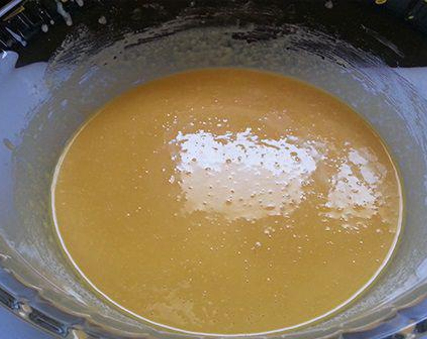 step 2 Melt the Ghee (3/4 cup) and pour it in a microwave-safe bowl. Add Powdered Confectioners Sugar (1 cup). Mix well then add the toasted flour. Continue to mix - make sure there are no lumps.
