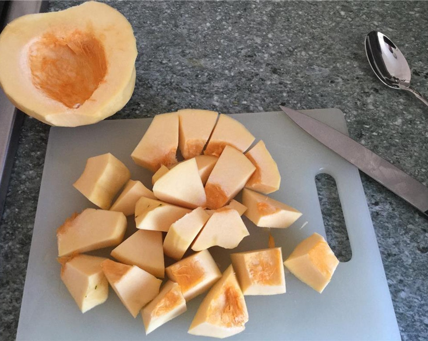 step 3 Cut the squash in half. Remove the seeds with a spoon and dice it.