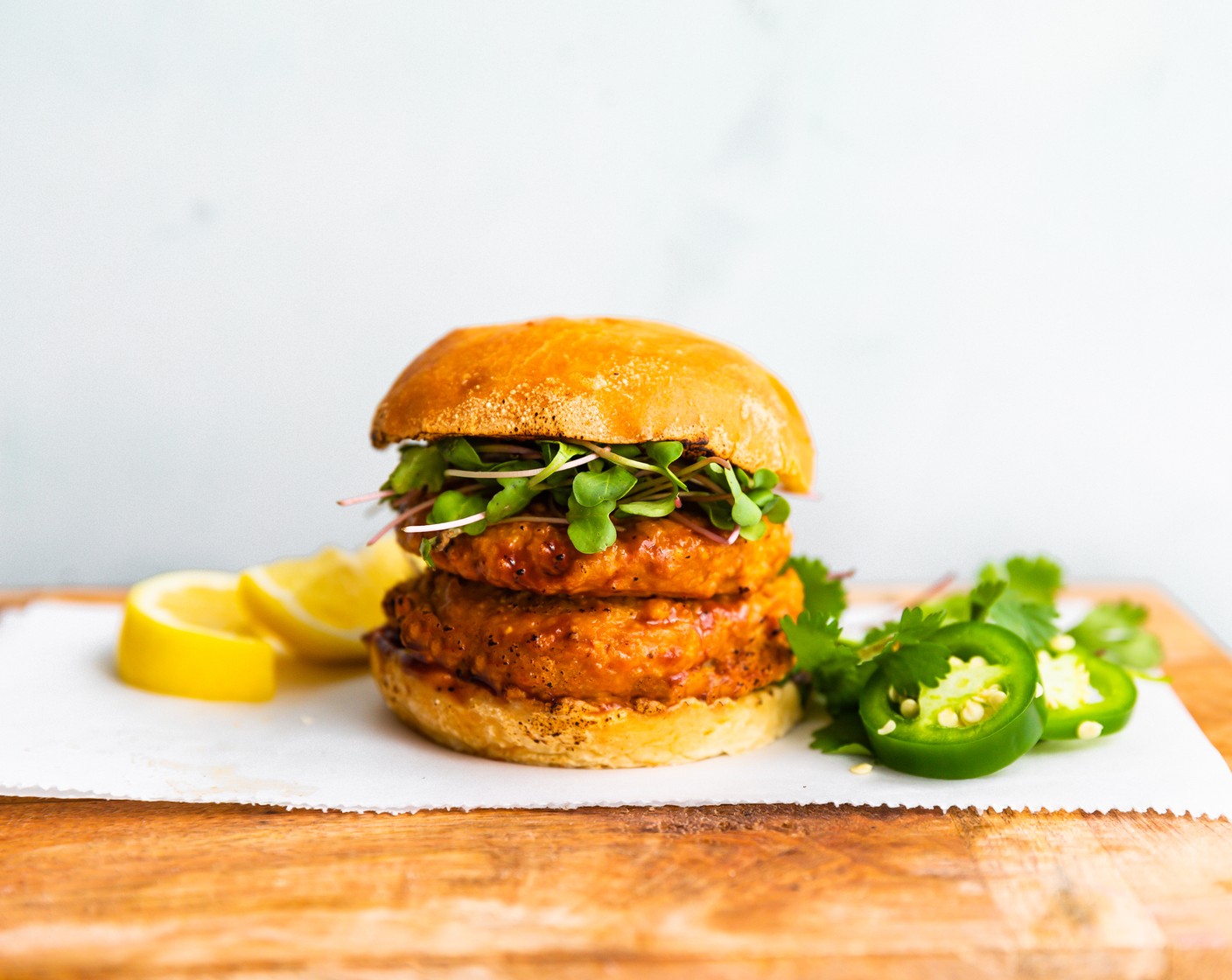 step 6 Serve between toasted gluten free buns as a salmon burger or forgo the buns and plate with cooked vegetables and your favorite dipping sauce for the baked salmon cake option.