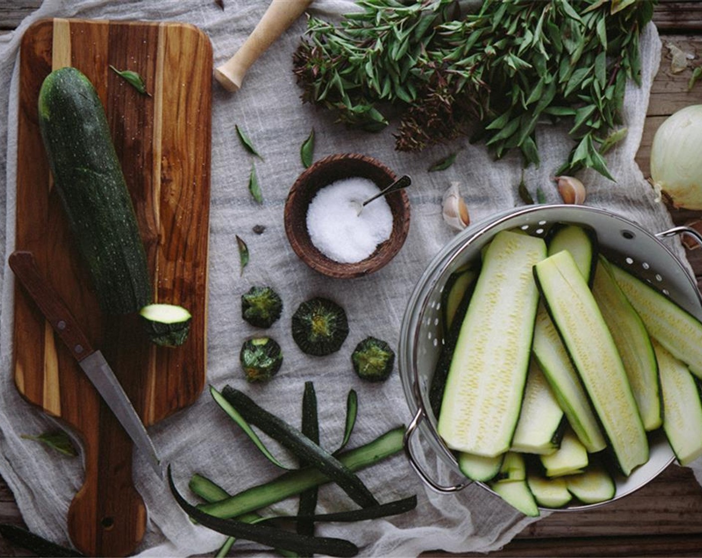 step 2 Slice the Zucchini (5) lengthwise ⅓ inch thick.