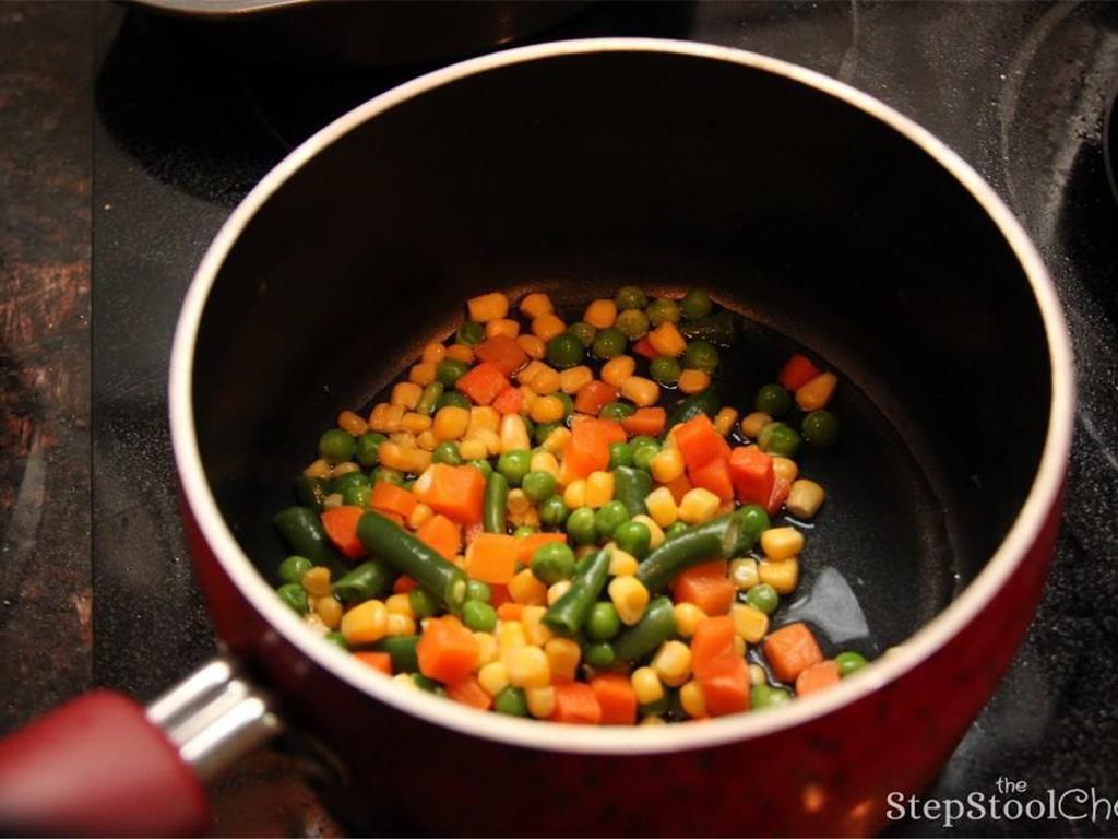 Step 3 of Rainbow Pasta Salad Recipe: Cook the Frozen Mixed Vegetables (1 cup) according to package's instructions.